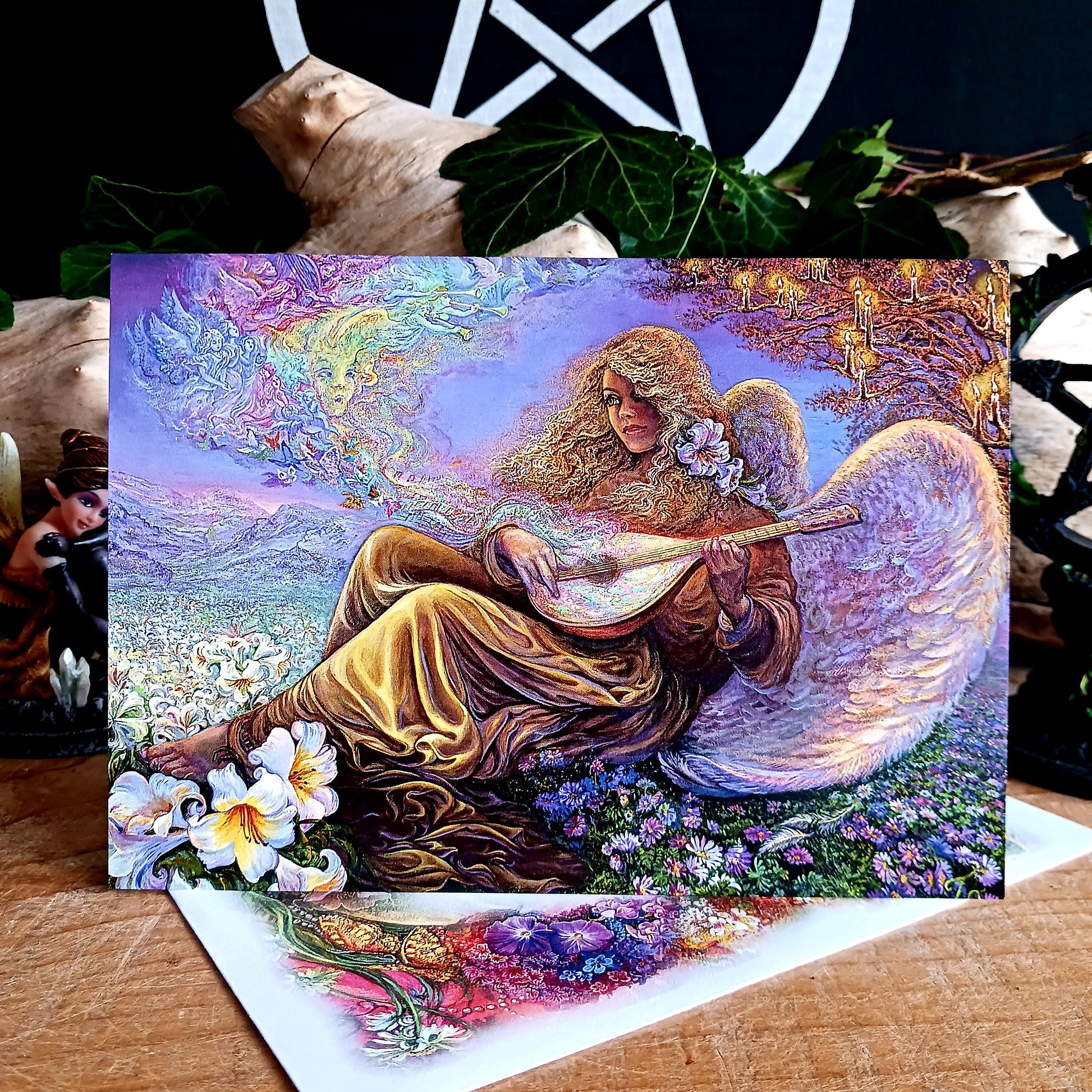 This beautiful greetings card entitled Angel Melodies is designed by Josephine Wall. The card is blank inside for you to write your own message. Perfect for any occasion.