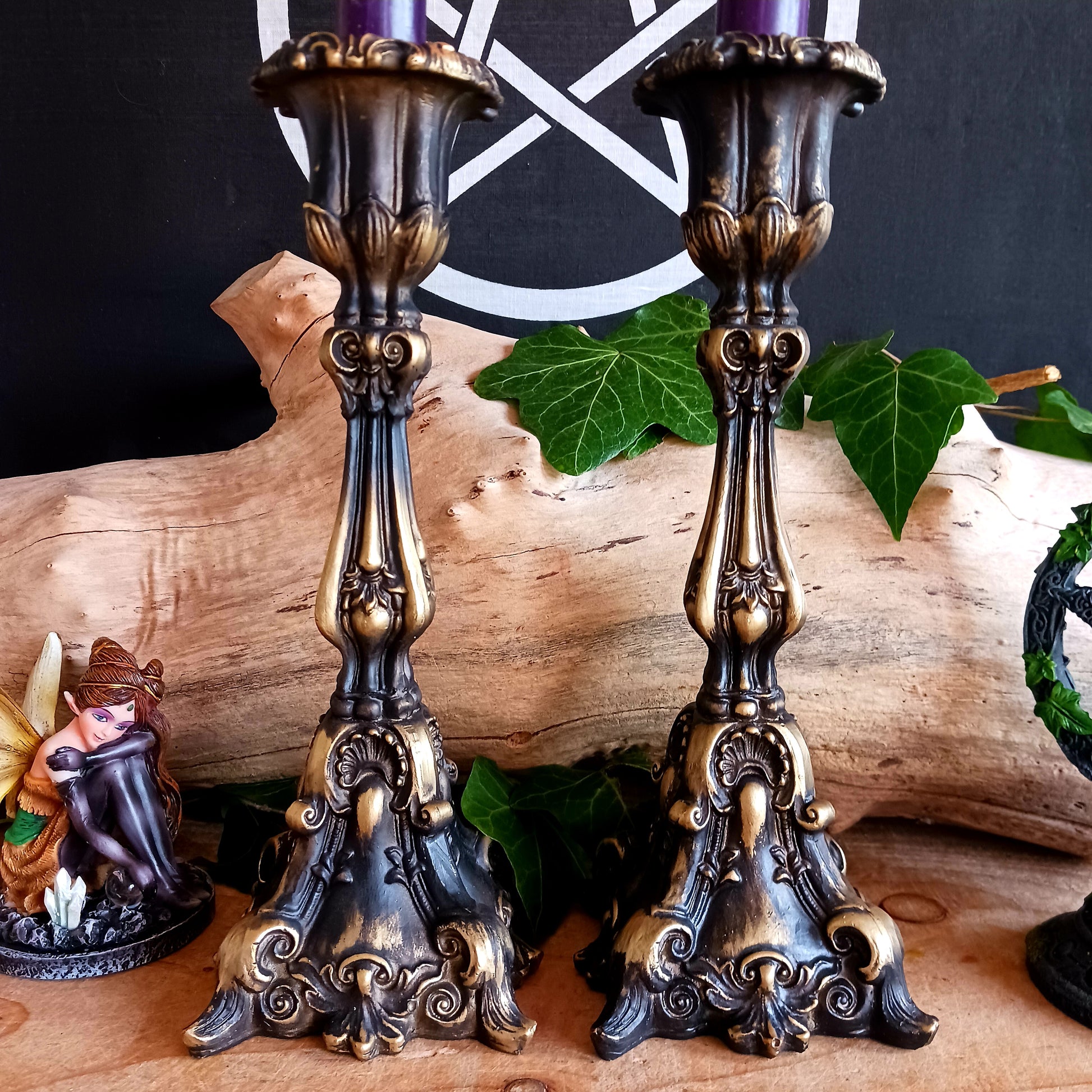 This set of ornate baroque style candle holders have a stunning antique gold finish and radiate beauty and grandeur. They will certainly enhance any home decor in a way many others wouldn't.