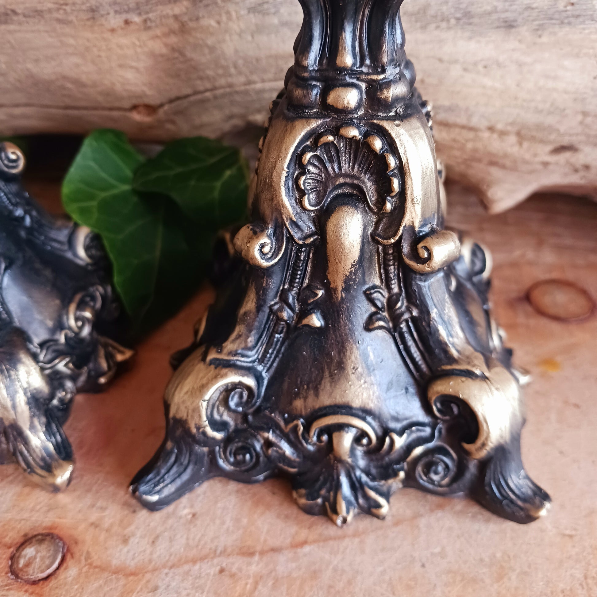 This set of ornate baroque style candle holders have a stunning antique gold finish and radiate beauty and grandeur. They will certainly enhance any home decor in a way many others wouldn't.