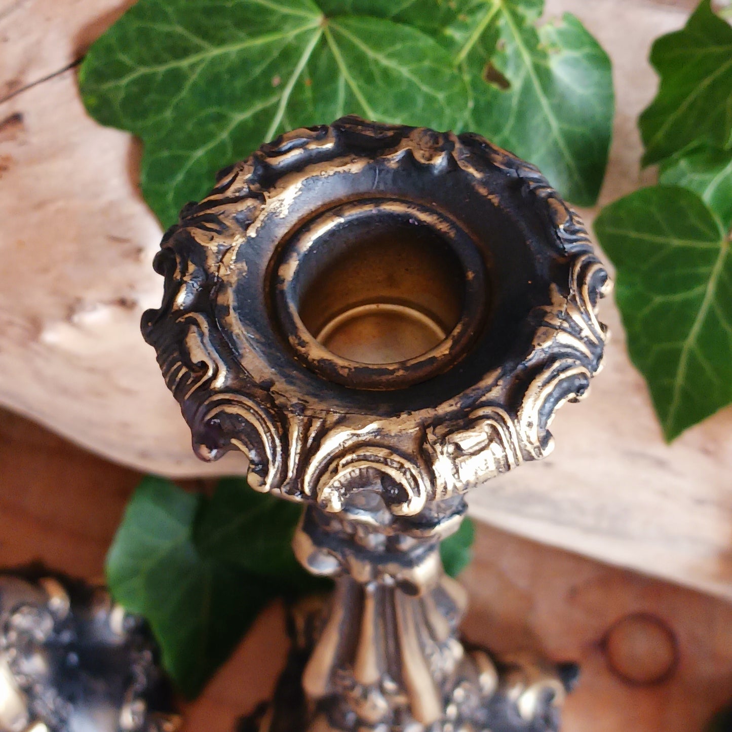 This set of ornate baroque style candle holders have a stunning antique gold finish and radiate beauty and grandeur. They will certainly enhance any home decor in a way many others wouldn't.