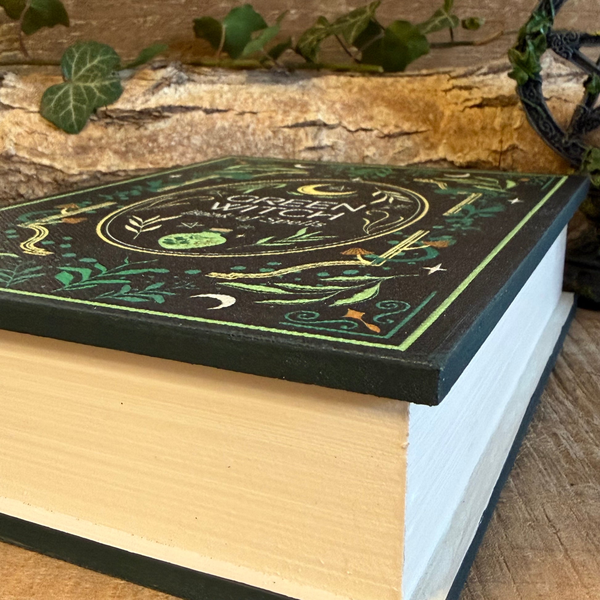 Store crystals and spells in the Green Witch book shaped storage box. Grimoire-style secret storage from the Green Witch mystical collection.