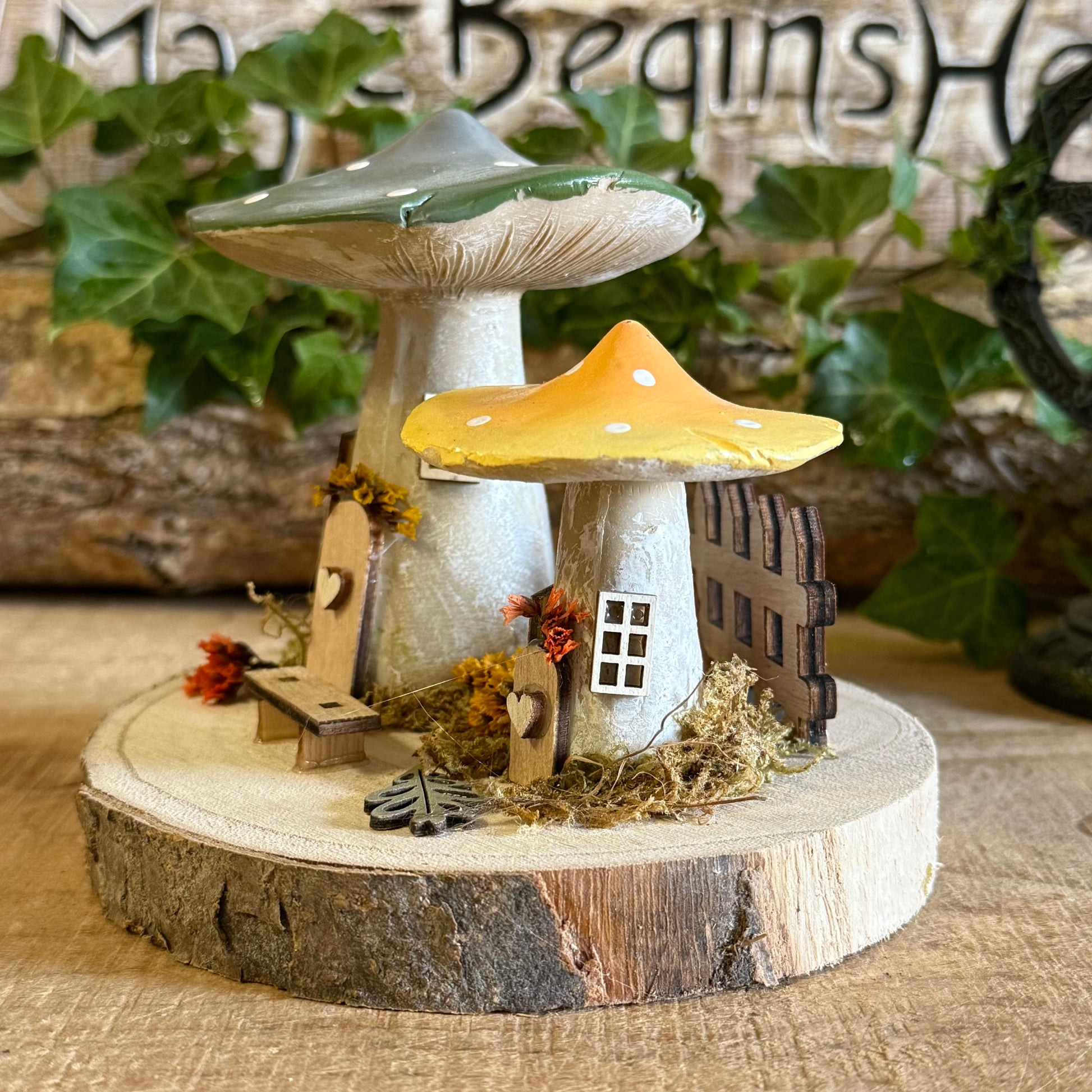 Discover the gentle magic of our Folk Art Mushroom Two Cottages (Medium) — a charming pair of fairy houses brought to life with hand painted folk art detail. Each piece is crafted with care, featuring vibrant colours, floral patterns, and rustic textures that capture the joy and simplicity of woodland living.