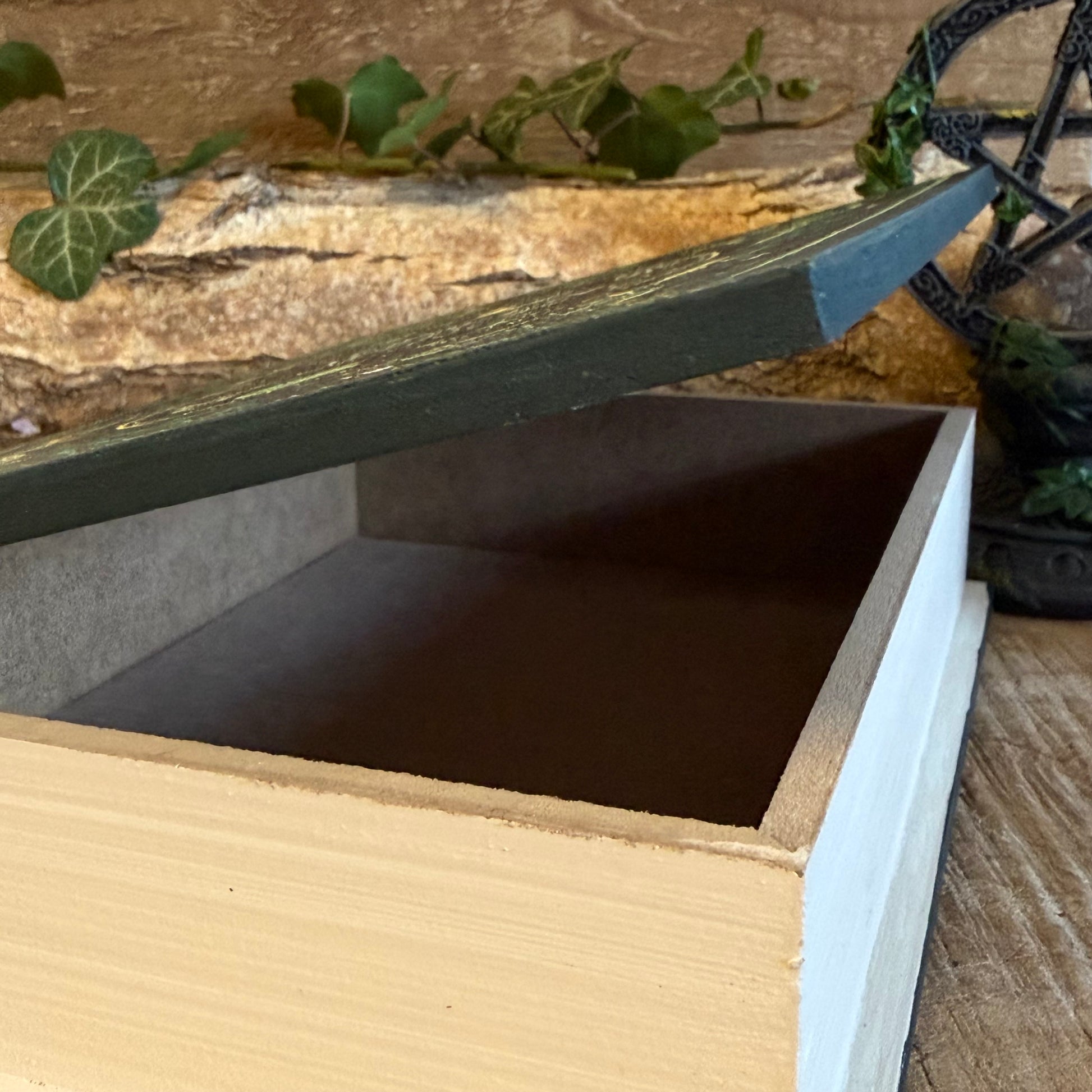 Store crystals and spells in the Green Witch book shaped storage box. Grimoire-style secret storage from the Green Witch mystical collection.