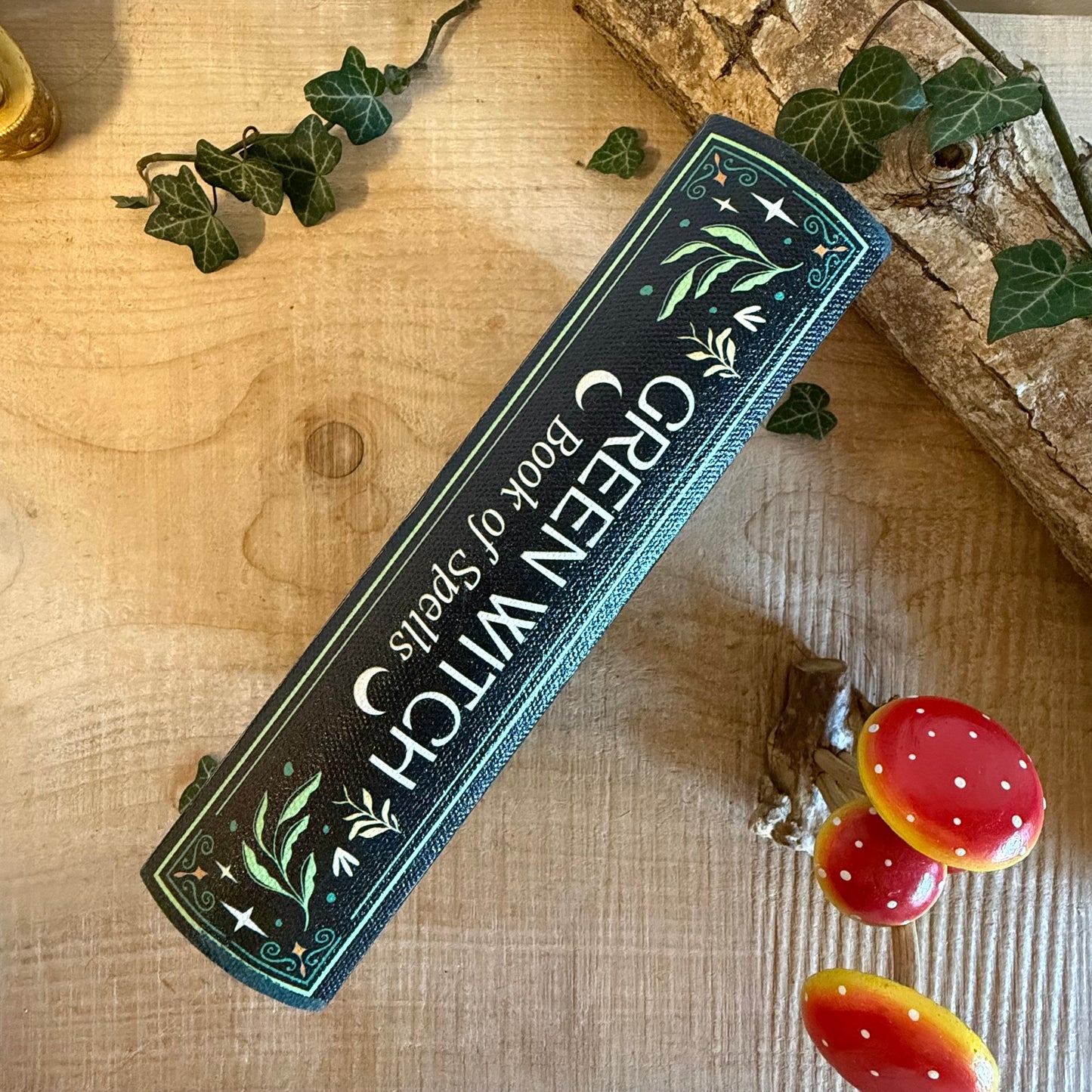 Store crystals and spells in the Green Witch book shaped storage box. Grimoire-style secret storage from the Green Witch mystical collection.