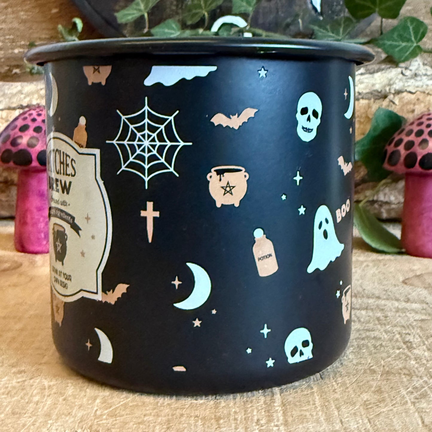 Even witches need to keep hydrated! This enamel-style mug features a fun Halloween print with a vintage-inspired “Witches Brew” illustration, perfect for enjoying a hot pumpkin spice latte or cosy autumn beverage. Part of the Halloween range by Something Different, it pairs beautifully with other spooky gifts and seasonal décor. Designed for hand wash only, do not microwave or use over an open flame. A charming and practical addition to your Halloween celebrations or gift collection.