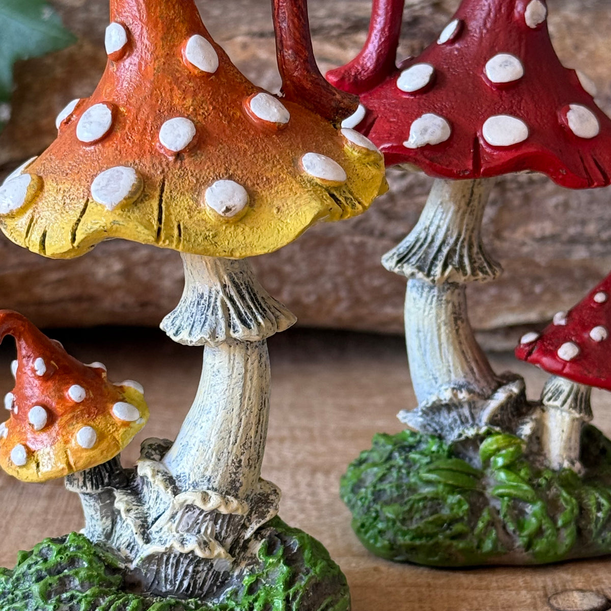 Set of 2 hand-painted mushroom sculptures, 12.5cm tall, with whimsical woodland detailing. Perfect for fairy gardens, fantasy displays and mushroom lovers.