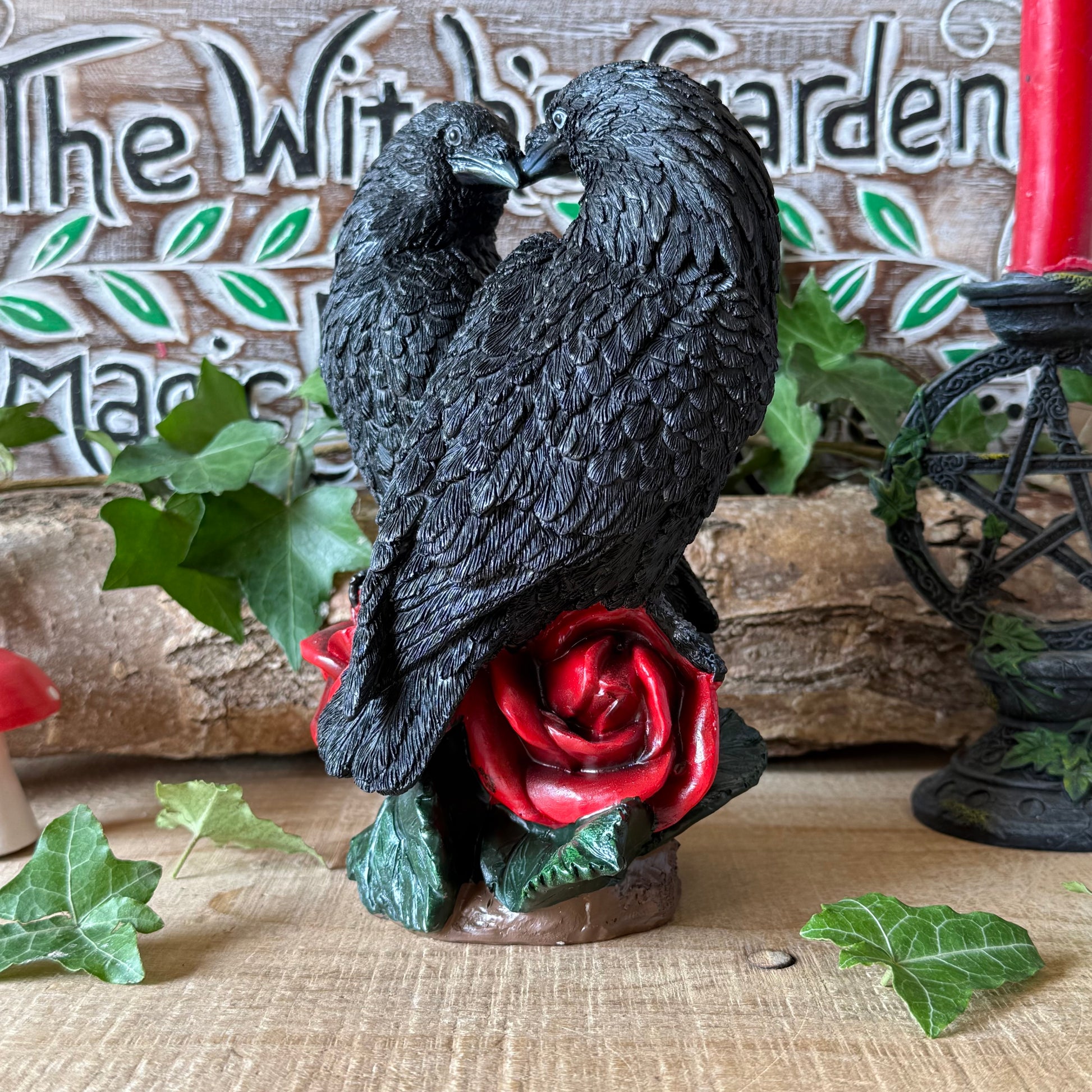 Nemesis Now Raven Romance figurine featuring two black ravens and red roses. Hand-painted gothic resin ornament for collectors, altars and raven lovers.