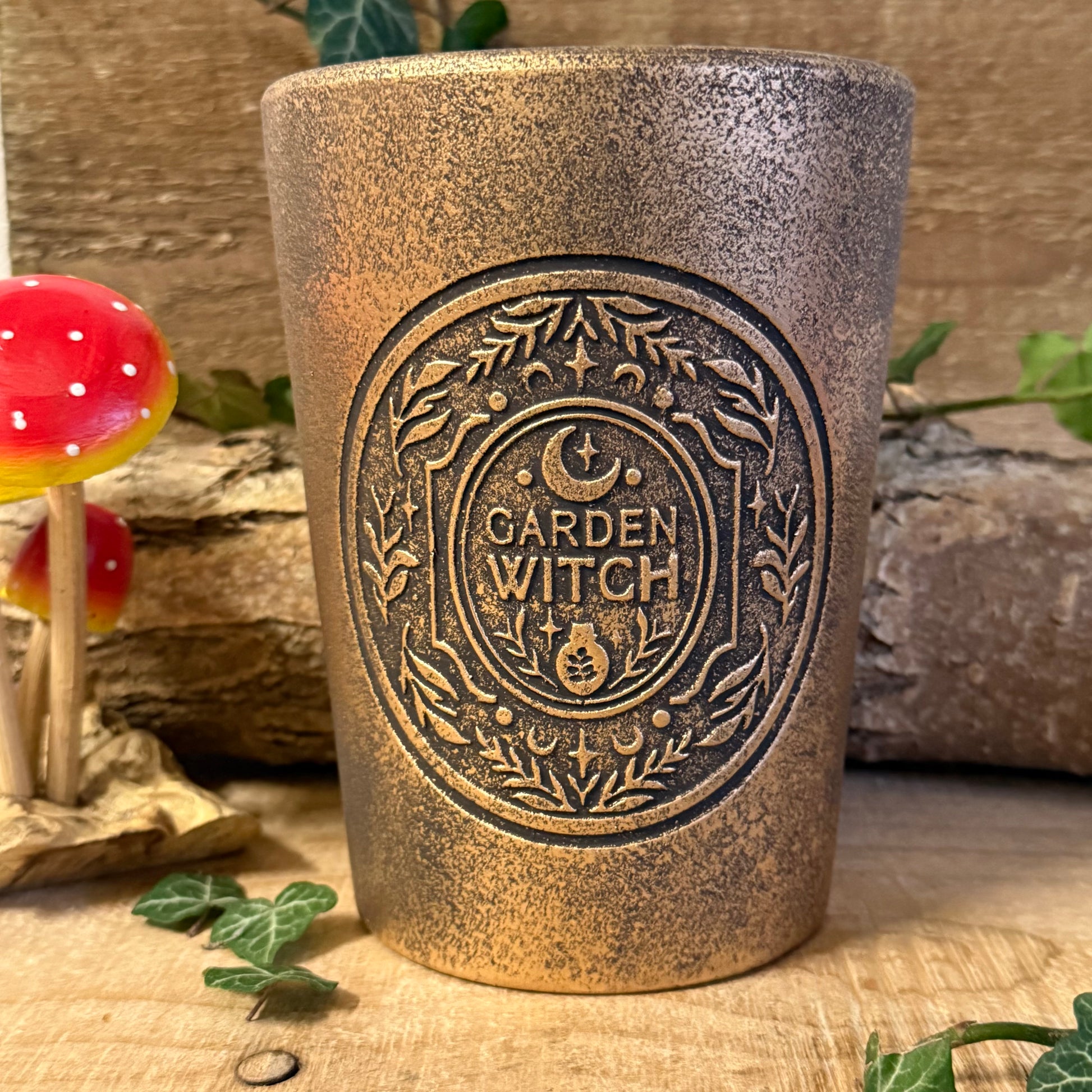 Garden Witch Terracotta Plant Pot – Bronze Effect Herb Planter

Grow herbs and botanicals in the Garden Witch bronze effect terracotta plant pot. Rustic witch design for altars, gardens, and patios.