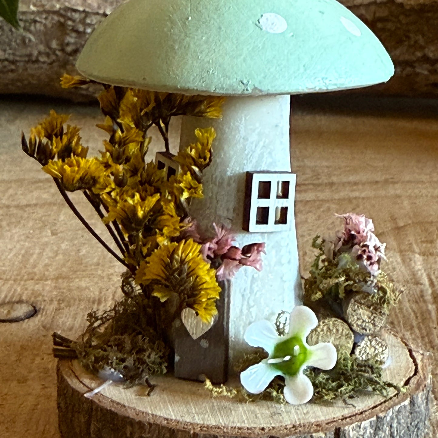 Step into a storybook world with our Spring Folk Art Mushroom Cottage, a charming miniature home inspired by blooming meadows and enchanted forests. Each cottage is hand painted with loving detail, featuring bright spring tones and floral folk art patterns that celebrate renewal and the magic of nature’s awakening.