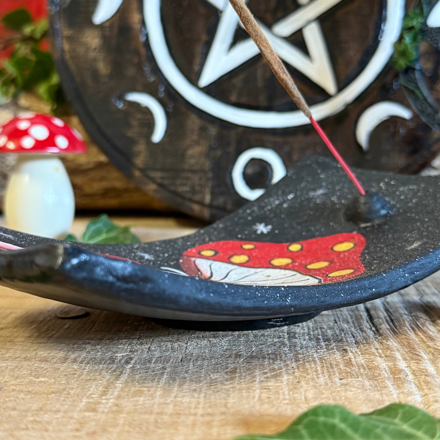 Invite a sprinkle of woodland magic into your home with our Terracotta Mushroom Incense Holder, lovingly handcrafted in Bali, Indonesia. Each piece is shaped from natural terracotta and hand painted with intricate detail, capturing the rustic beauty of forest toadstools kissed by the morning dew.