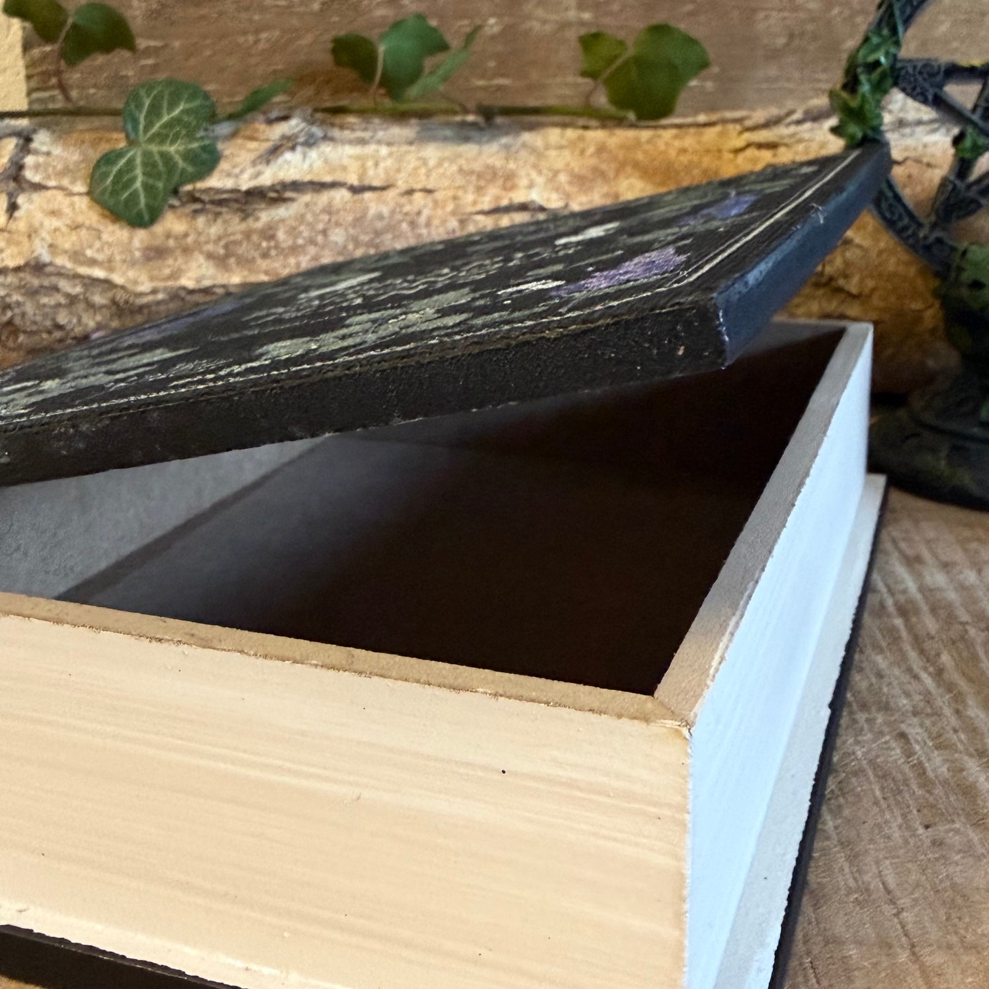Hide treasures in the Library of Poisonous Plants book shaped storage box. Gothic botanical MDF keepsake box for secret storage and decor.