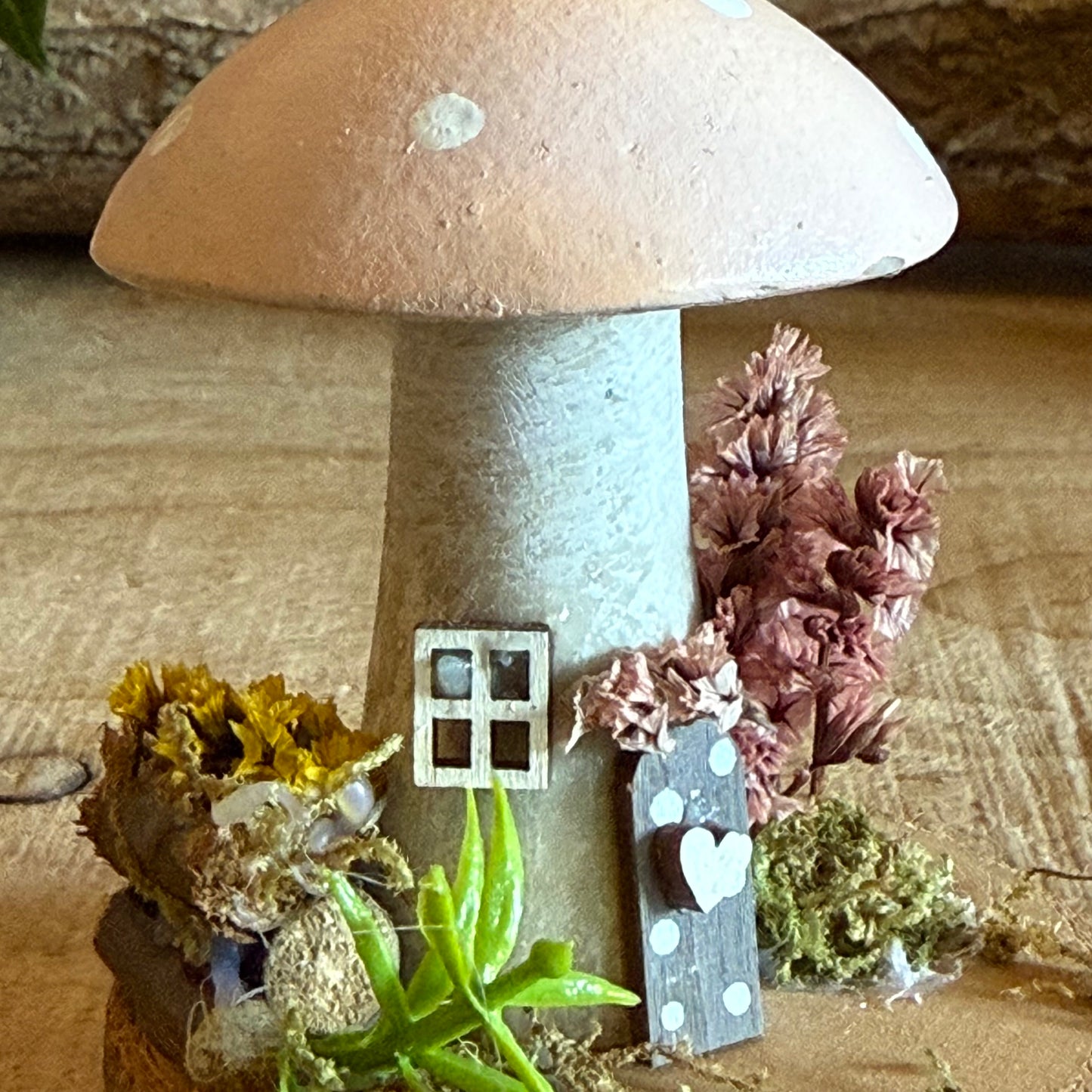 Step into a storybook world with our Spring Folk Art Mushroom Cottage, a charming miniature home inspired by blooming meadows and enchanted forests. Each cottage is hand painted with loving detail, featuring bright spring tones and floral folk art patterns that celebrate renewal and the magic of nature’s awakening.