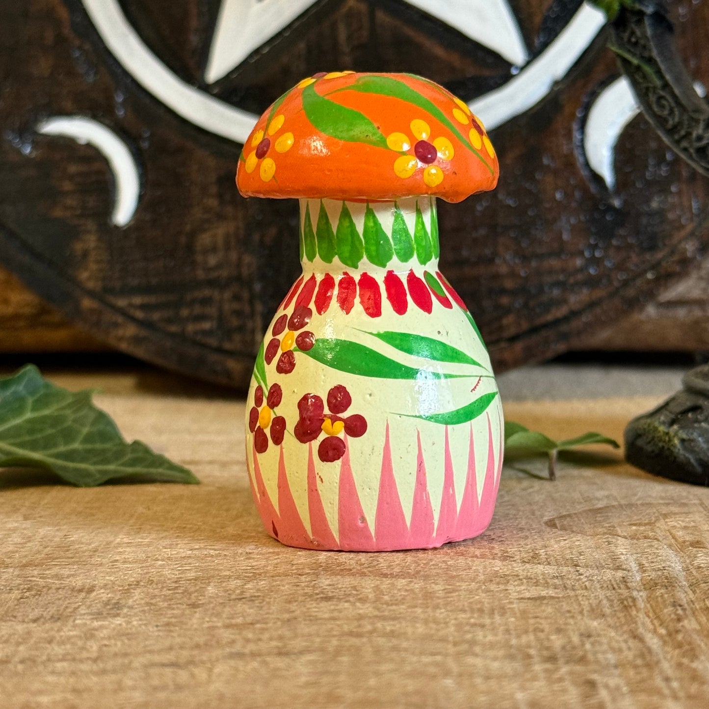 Step into the enchanted woodlands with our Hand Painted Wooden Mushroom Ornament, a charming treasure that feels as though it has grown straight from the mossy forest floor. Each mushroom is lovingly hand carved and painted by skilled artisans, creating a one-of-a-kind piece that celebrates the simple magic of nature.