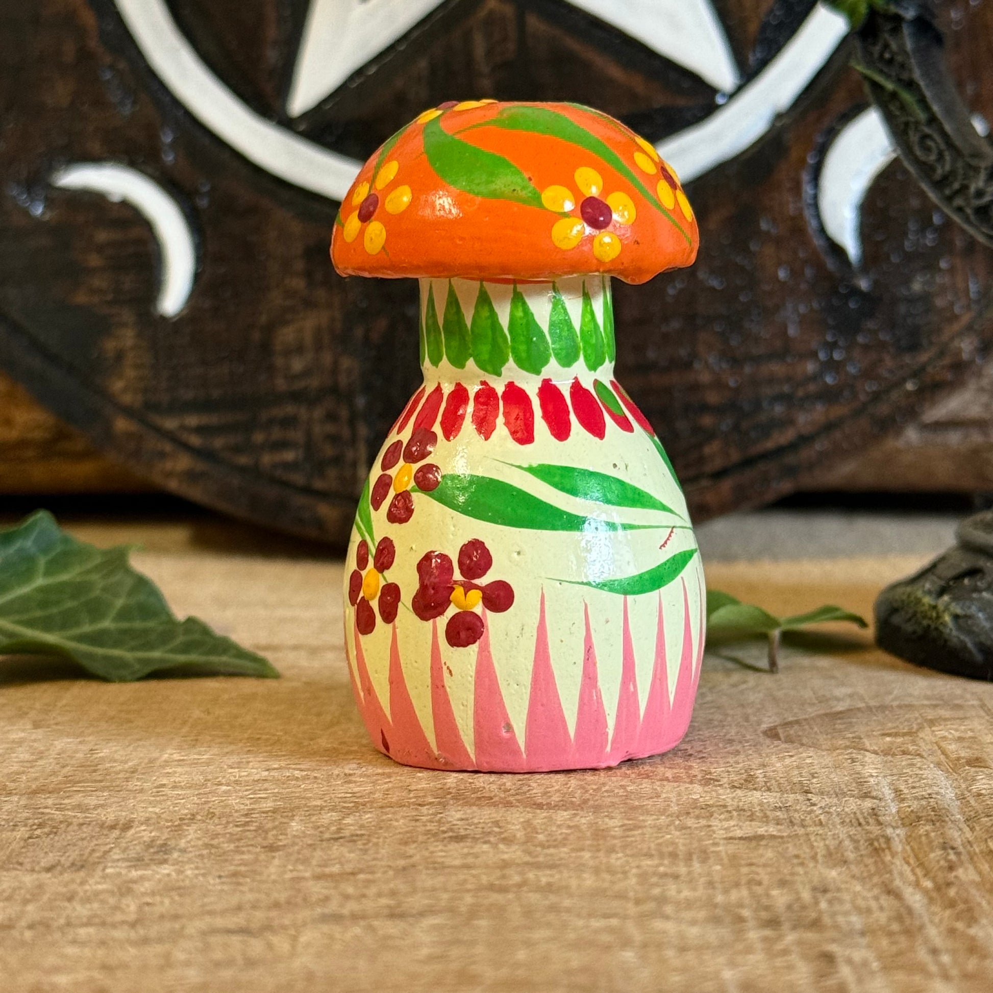 Step into the enchanted woodlands with our Hand Painted Wooden Mushroom Ornament, a charming treasure that feels as though it has grown straight from the mossy forest floor. Each mushroom is lovingly hand carved and painted by skilled artisans, creating a one-of-a-kind piece that celebrates the simple magic of nature.