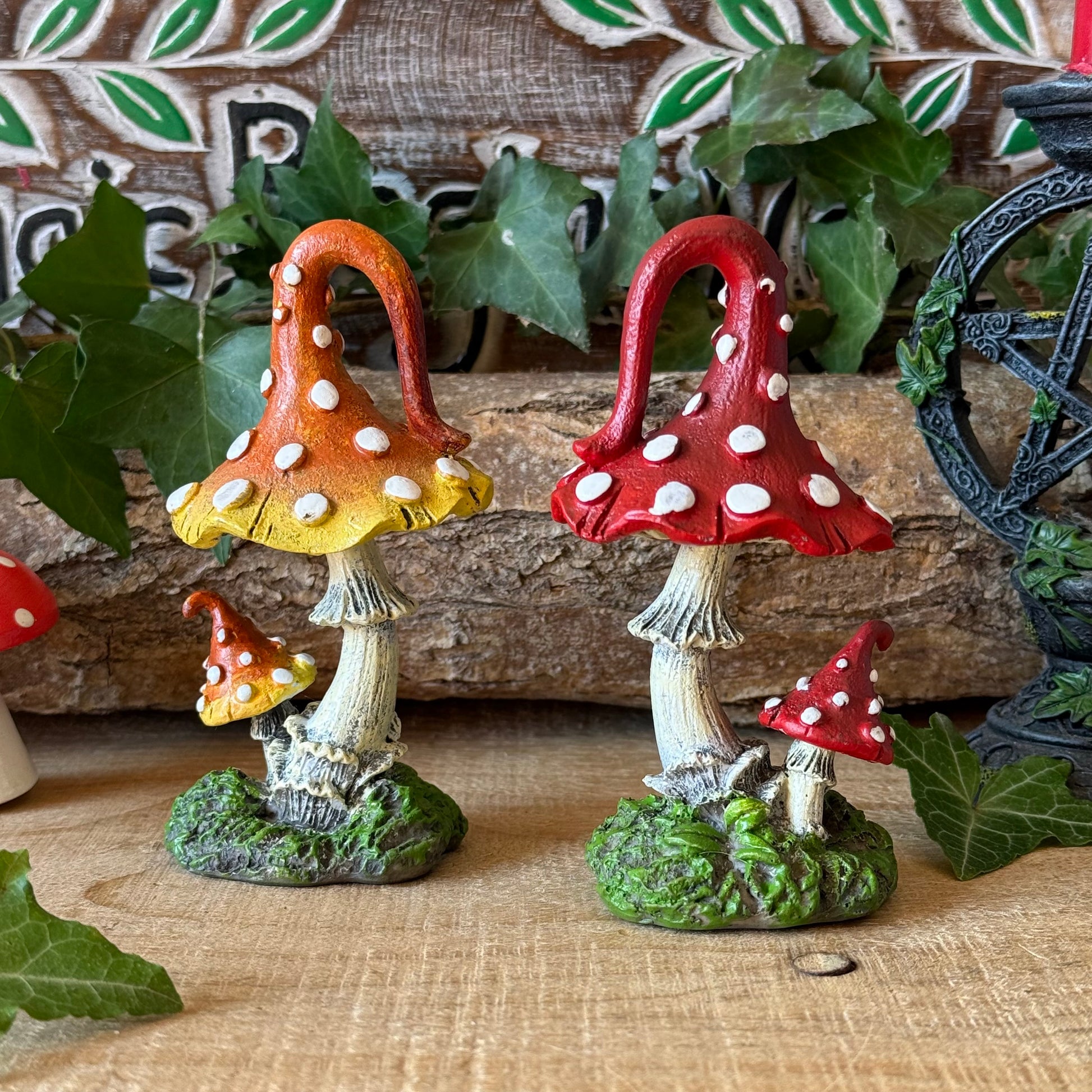 Set of 2 hand-painted mushroom sculptures, 12.5cm tall, with whimsical woodland detailing. Perfect for fairy gardens, fantasy displays and mushroom lovers.