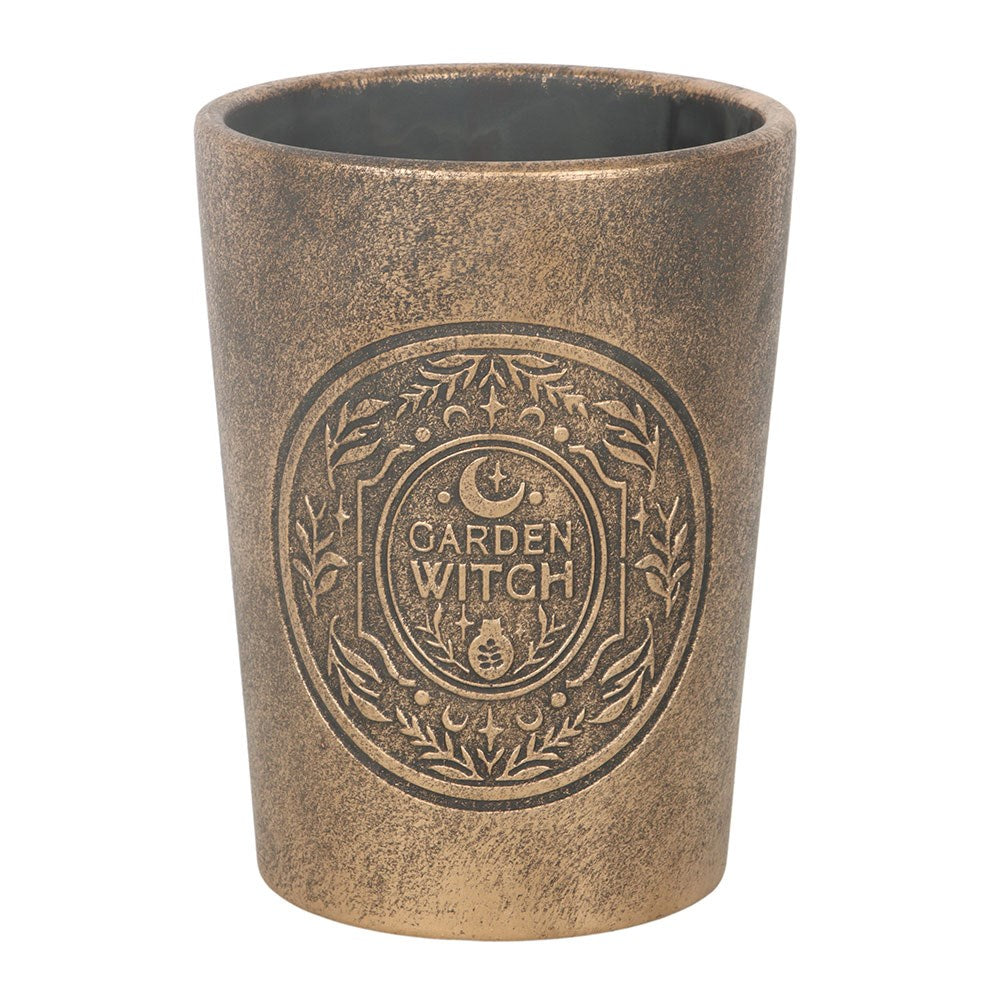 Grow herbs and botanicals in the Garden Witch bronze effect terracotta plant pot. Rustic witch design for altars, gardens, and patios.