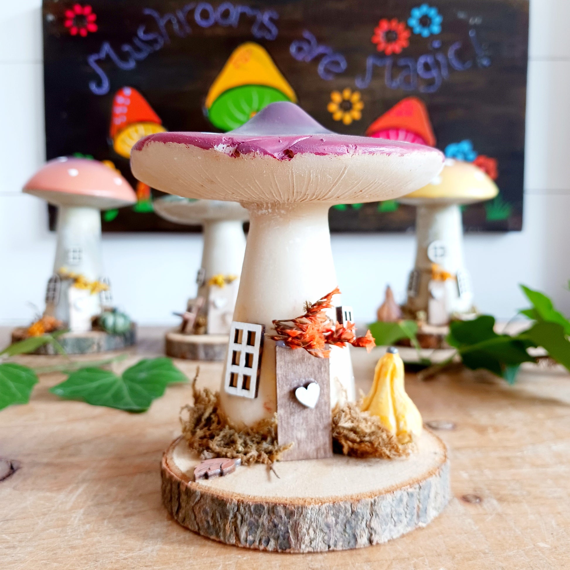 Add a whimsical touch to your home with these charming folk art mushroom cottages. Perfect for all occasions, these handcrafted ornaments are made from high-quality polystone and wood, featuring delightful details and a rustic base made from natural wood slices. Whether placed on a shelf, desk, or windowsill, these miniature cottages bring warmth and personality to any space. Ideal for gifting or as a unique addition to your home décor collection.