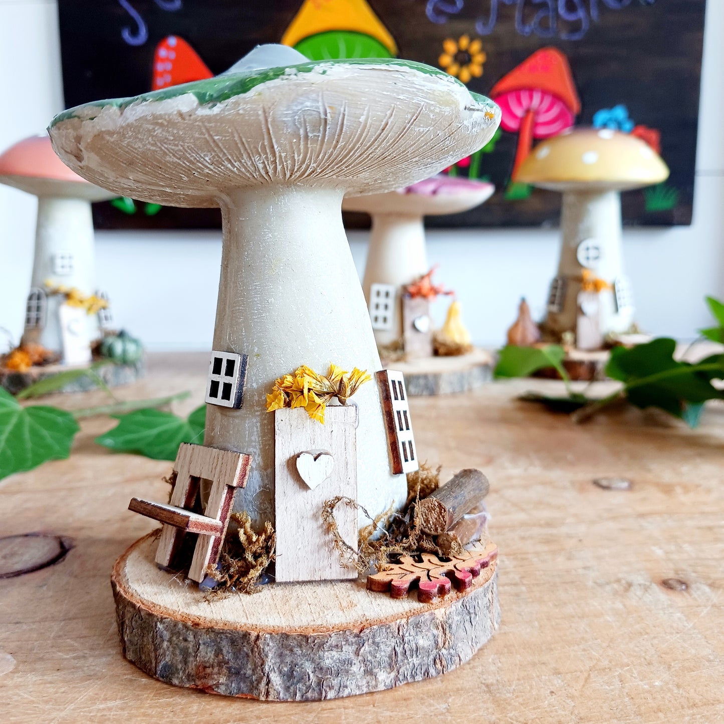Add a whimsical touch to your home with these charming folk art mushroom cottages. Perfect for all occasions, these handcrafted ornaments are made from high-quality polystone and wood, featuring delightful details and a rustic base made from natural wood slices. Whether placed on a shelf, desk, or windowsill, these miniature cottages bring warmth and personality to any space. Ideal for gifting or as a unique addition to your home décor collection.