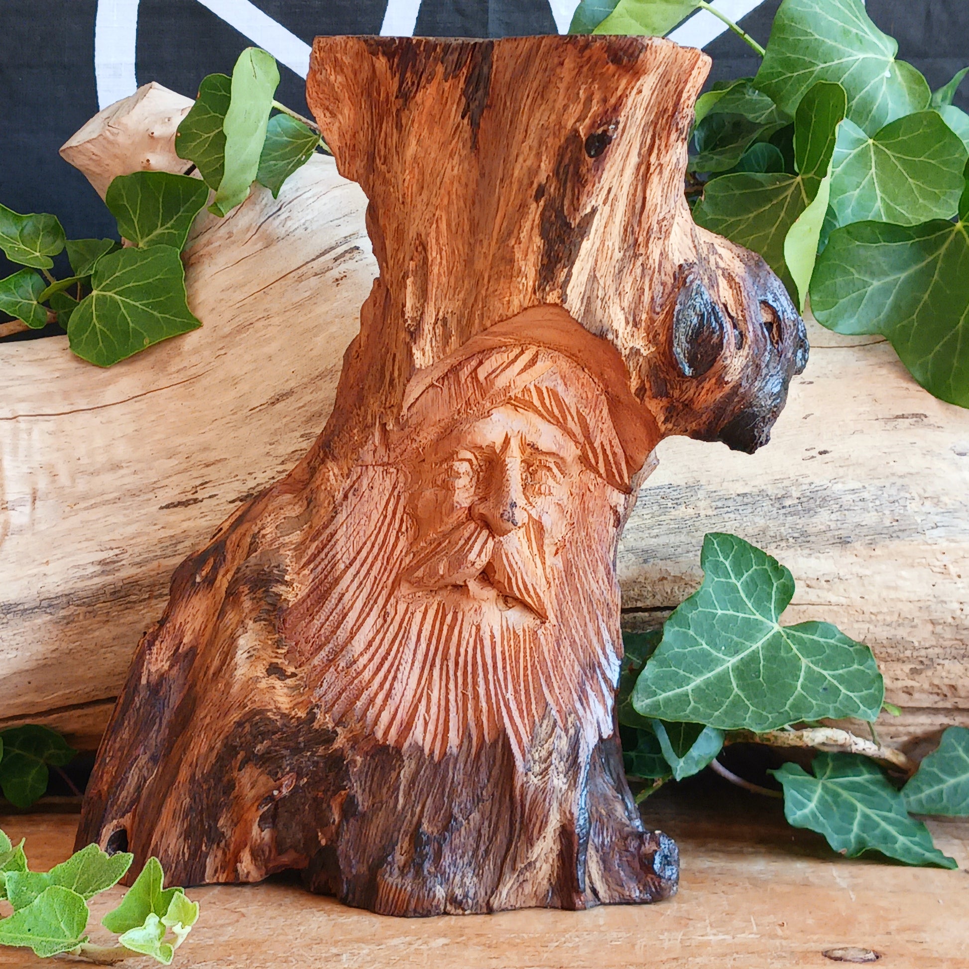 Bring a touch of magic to your home with this beautifully hand carved wooden wizard sculpture, expertly crafted by skilled artisans in Bali. Featuring two wise wizards, this enchanting piece celebrates folklore, fantasy and traditional craftsmanship, making it a unique addition to any home, altar or collection.