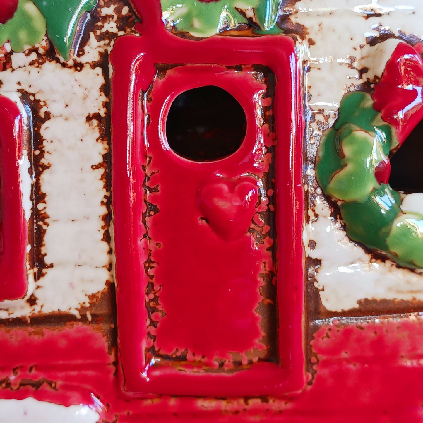 Step into a cosy winter wonderland with the Village Pottery Christmas Caravan Tealight Holder, a heart-warming piece crafted with love and festive magic. Measuring 13.5 x 18.5 x 7 cm, this hand-painted ceramic caravan glows with Christmas cheer, ready to light up your home with a gentle, enchanting flicker.