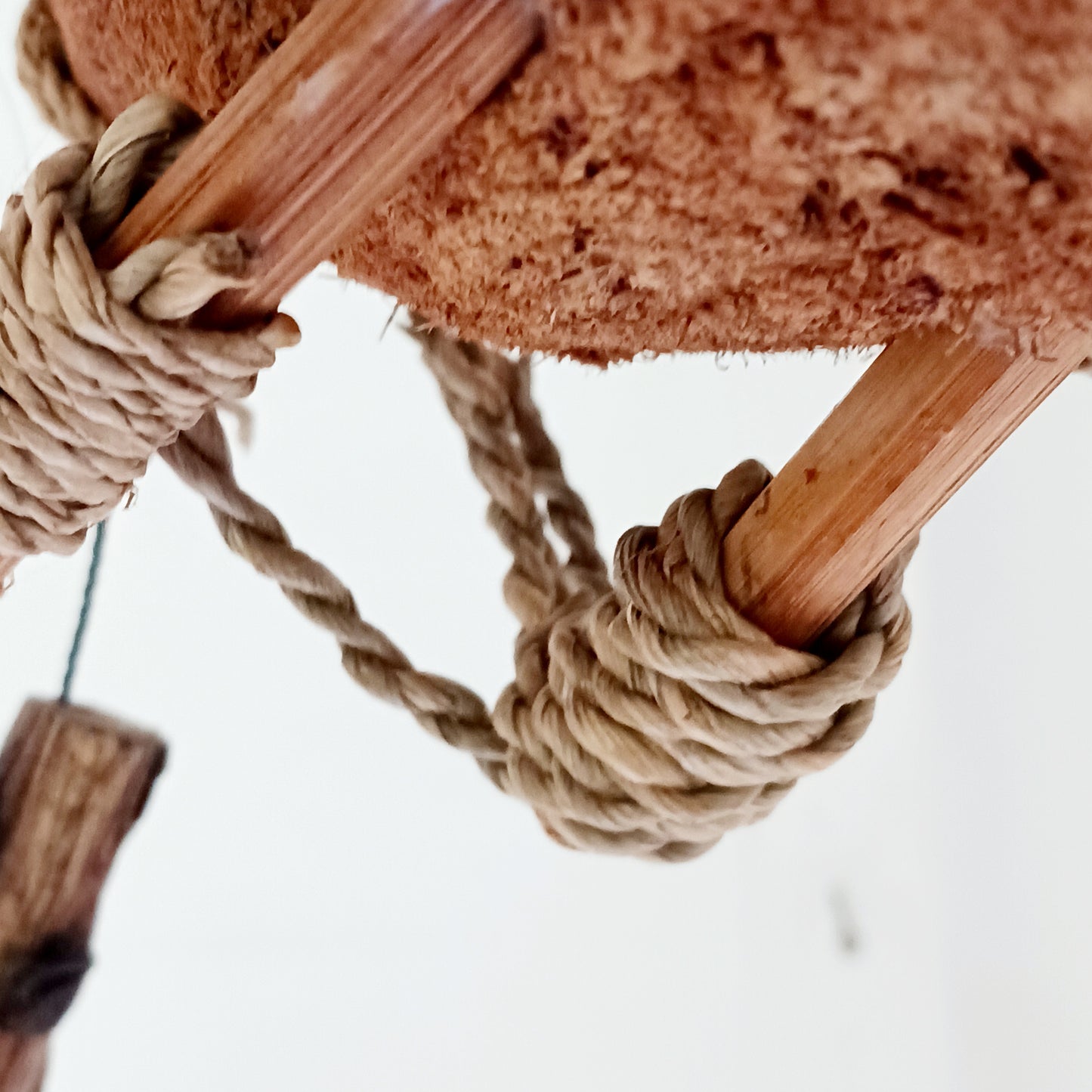 Add a touch of fantasy and natural craftsmanship to your home or garden with this Handmade Coconut Shell Flying Dragon Hanging Mobile. Carefully crafted from real coconut shells, husks, and wood, this unique decorative piece brings movement and character wherever it hangs.