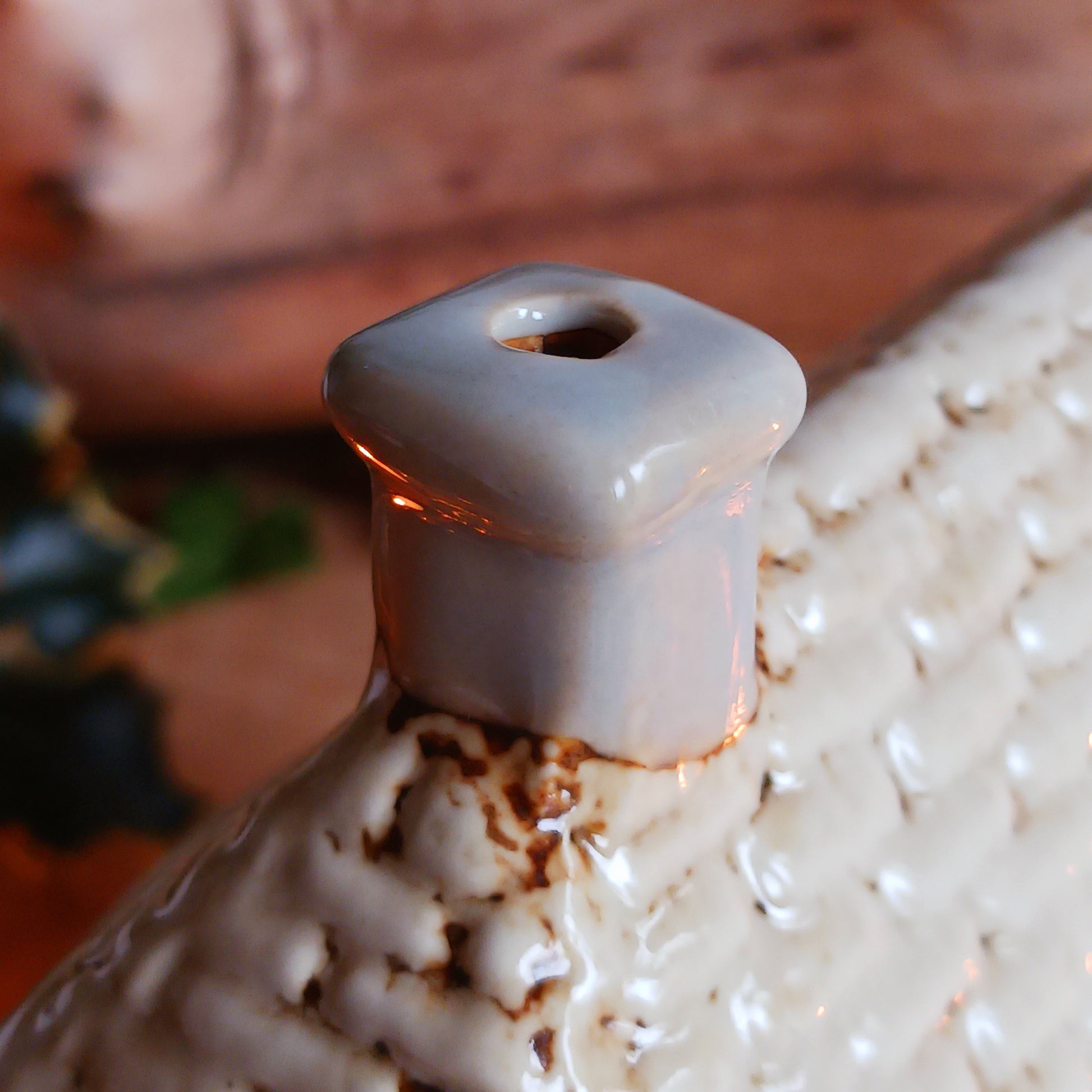 Bring the charm of traditional village life into your home with the Royal Oak Pub Ceramic Tealight Holder. Handcrafted in the Village Pottery workshop, this timeless piece features intricate detailing and rustic finishes inspired by a classic village pub.