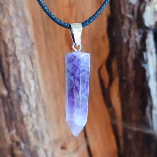  Amethyst, known as the stone of spirituality and peace, ranges in shades from soft lavender to deep violet. Believed to enhance intuition, calm the mind, and connect you to higher consciousness, this crystal pendant is perfect for meditation, energy work, or everyday wear. A meaningful gift for yourself or a loved one.