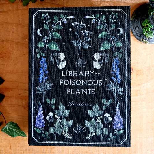 The Library of Poisonous Plants Book Shaped Storage Box is a darkly elegant way to keep treasures hidden in plain sight. 