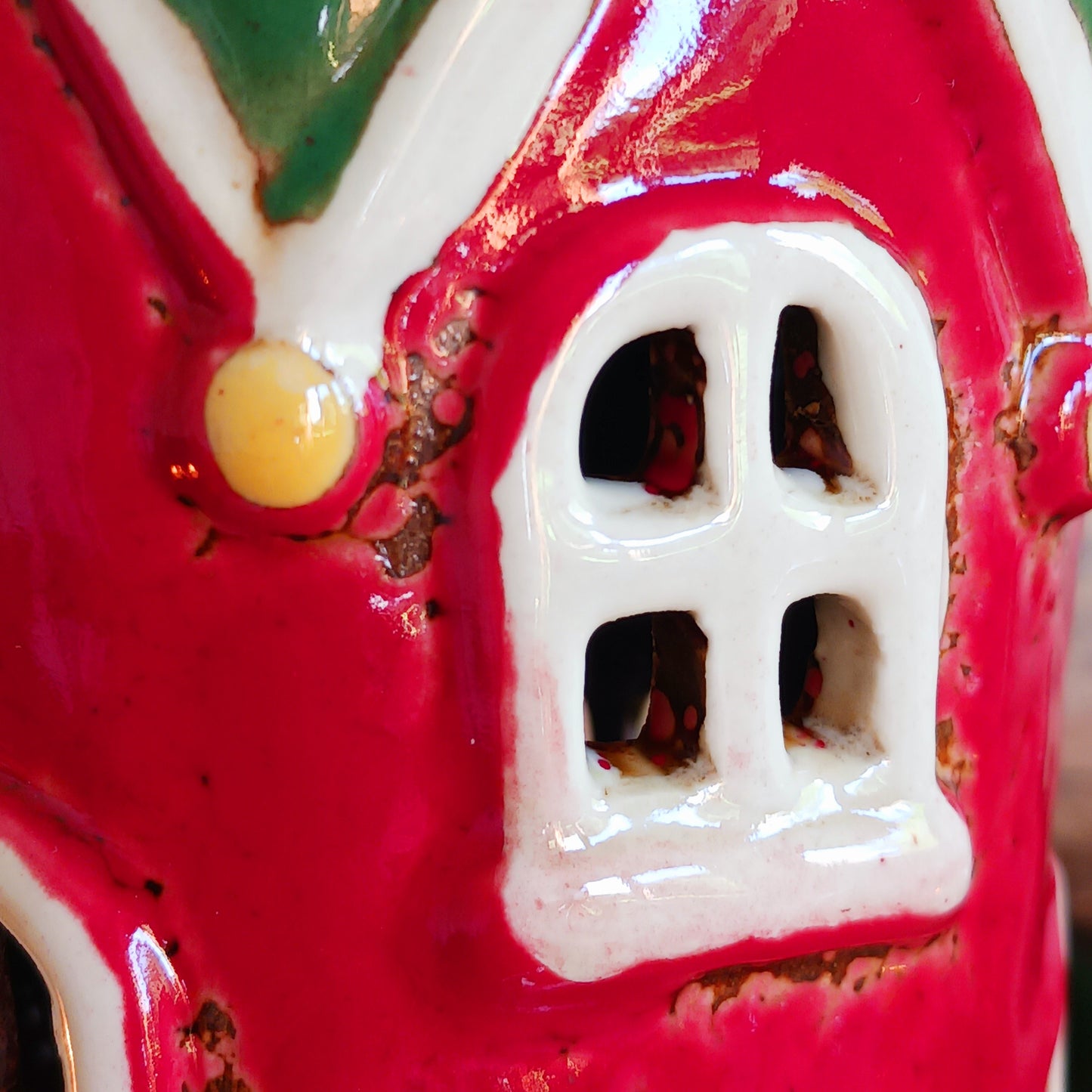 Step into the world of festive enchantment with the Village Pottery Christmas Elf Boot House Tealight Holder, a playful handcrafted ceramic creation bursting with Christmas spirit. Measuring 16 x 16 x 9.5 cm, this delightful piece takes the shape of a cheerful elf’s boot turned into a cosy little house, complete with twinkling windows and snowy details.