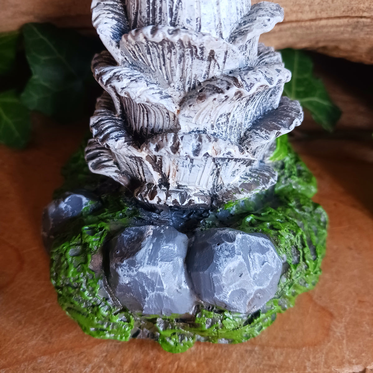Bring a touch of magic and whimsical charm to your home with Twizzle Tumblethorne, a wonderfully quirky purple mushroom sculpture perfect for lovers of fantasy, fairies and nature-inspired decor.