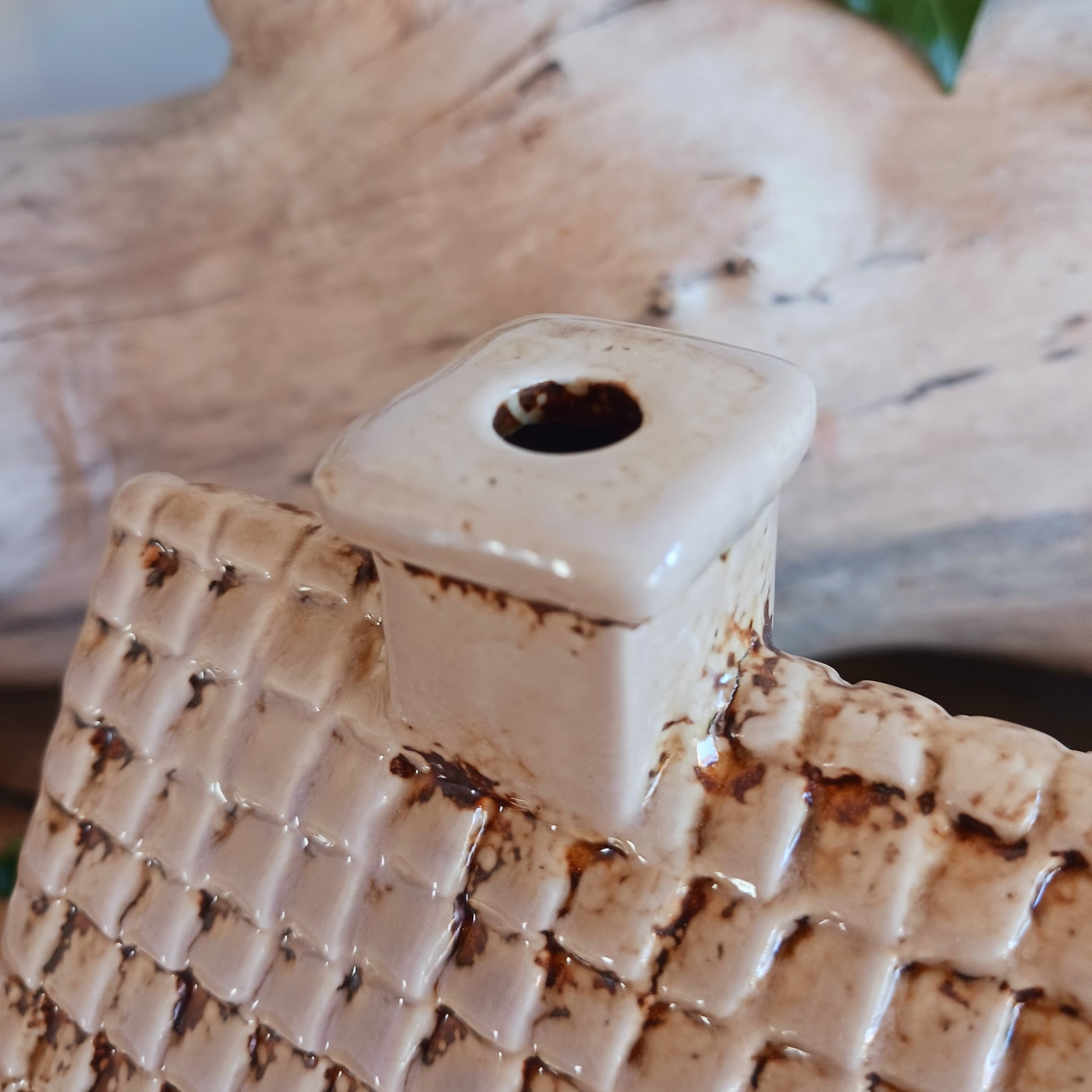 Nestled at the edge of a quiet enchanted village, The Stables tealight house by Village Pottery glows with a soft, grounding warmth. Crafted from ceramic and measuring 17x8x8cm, this rustic stable invites candlelight to flicker through its windows like a lantern for wandering spirits and kindred souls.