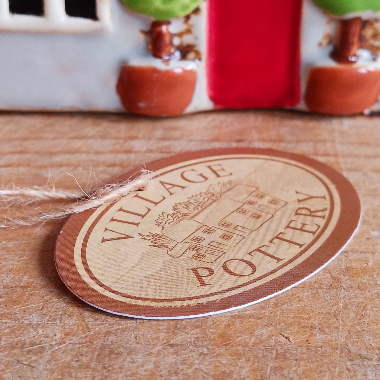 Bring the charm of traditional village life into your home with the Royal Oak Pub Ceramic Tealight Holder. Handcrafted in the Village Pottery workshop, this timeless piece features intricate detailing and rustic finishes inspired by a classic village pub.