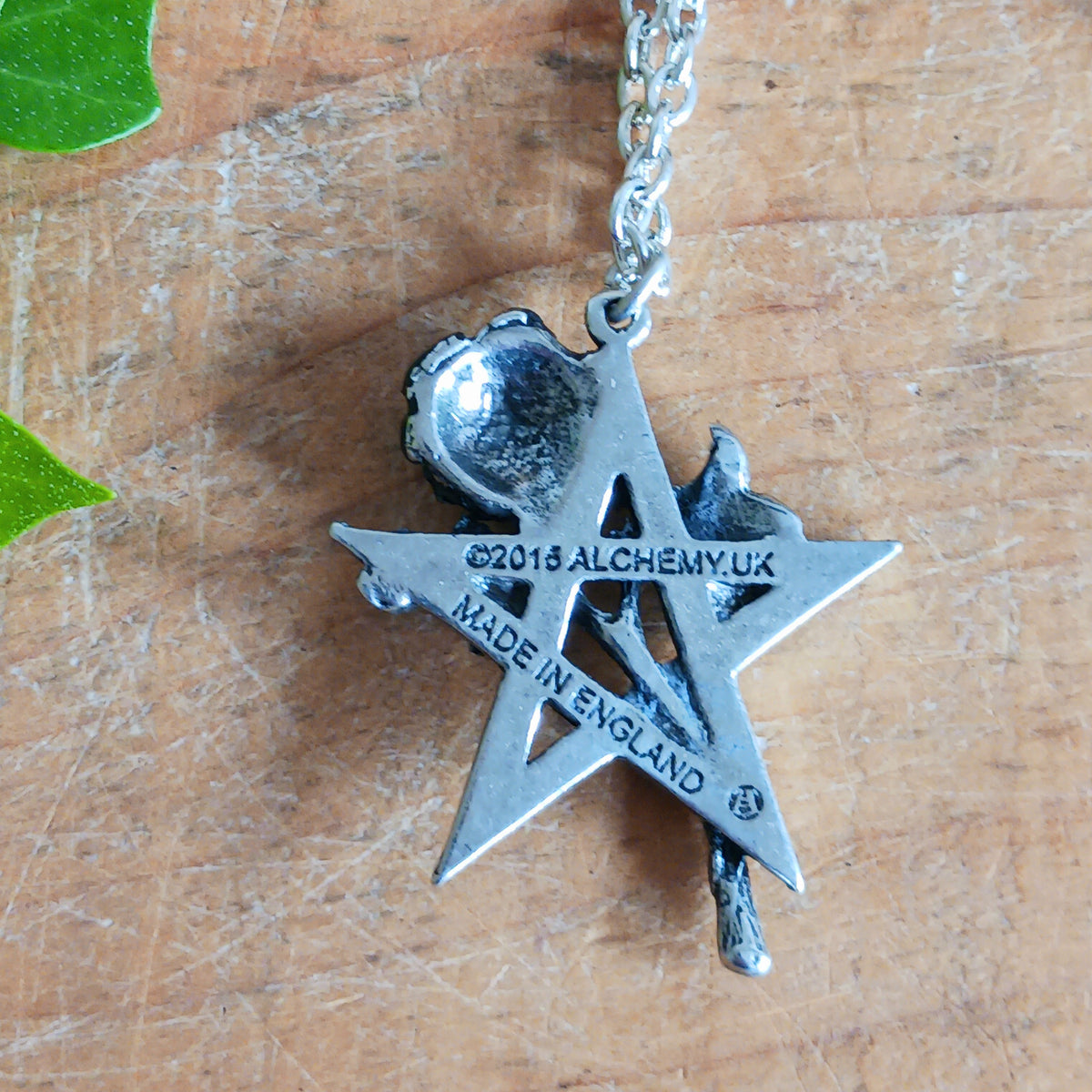 Embrace dark romance and mystical symbolism with this striking Alchemy England Gothic Pentagram and Black Rose Necklace. Featuring a detailed pewter pentagram entwined with a beautiful black-petalled rose, this distinctive gothic pendant combines spiritual symbolism with the timeless beauty of romantic gothic jewellery.