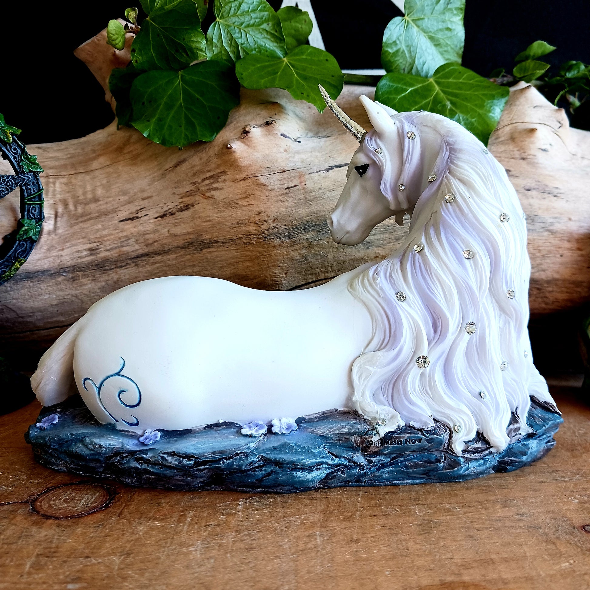 Bring a touch of magic into your home with this stunning Enchanted Unicorn Figurine, crafted from the imaginative world of Nemesis Now.