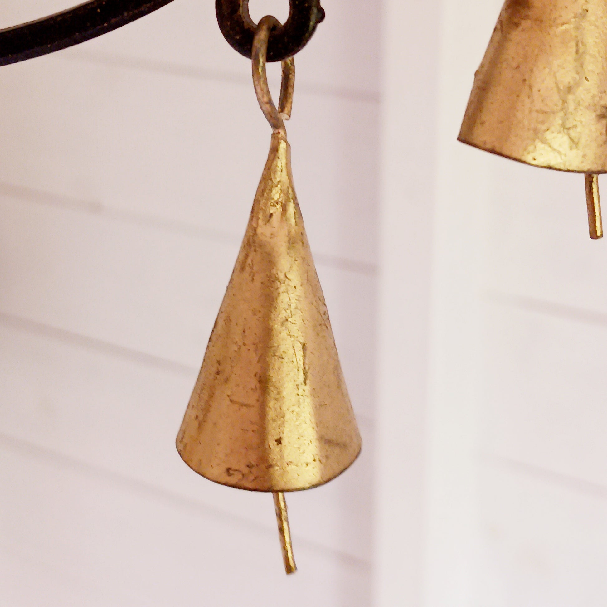 Bring mystical charm and a touch of gothic elegance to your space with this striking black metal pentagram decoration. Crafted with intricate detail, the five-point star hangs gracefully from a sturdy chain and features five fine brass bells that chime softly with movement. Perfect for pagan, Wiccan, or boho-inspired décor, this piece can be hung indoors or outdoors, adding both beauty and symbolism to your home. Ideal for altars, spiritual spaces, or as a unique wall hanging.