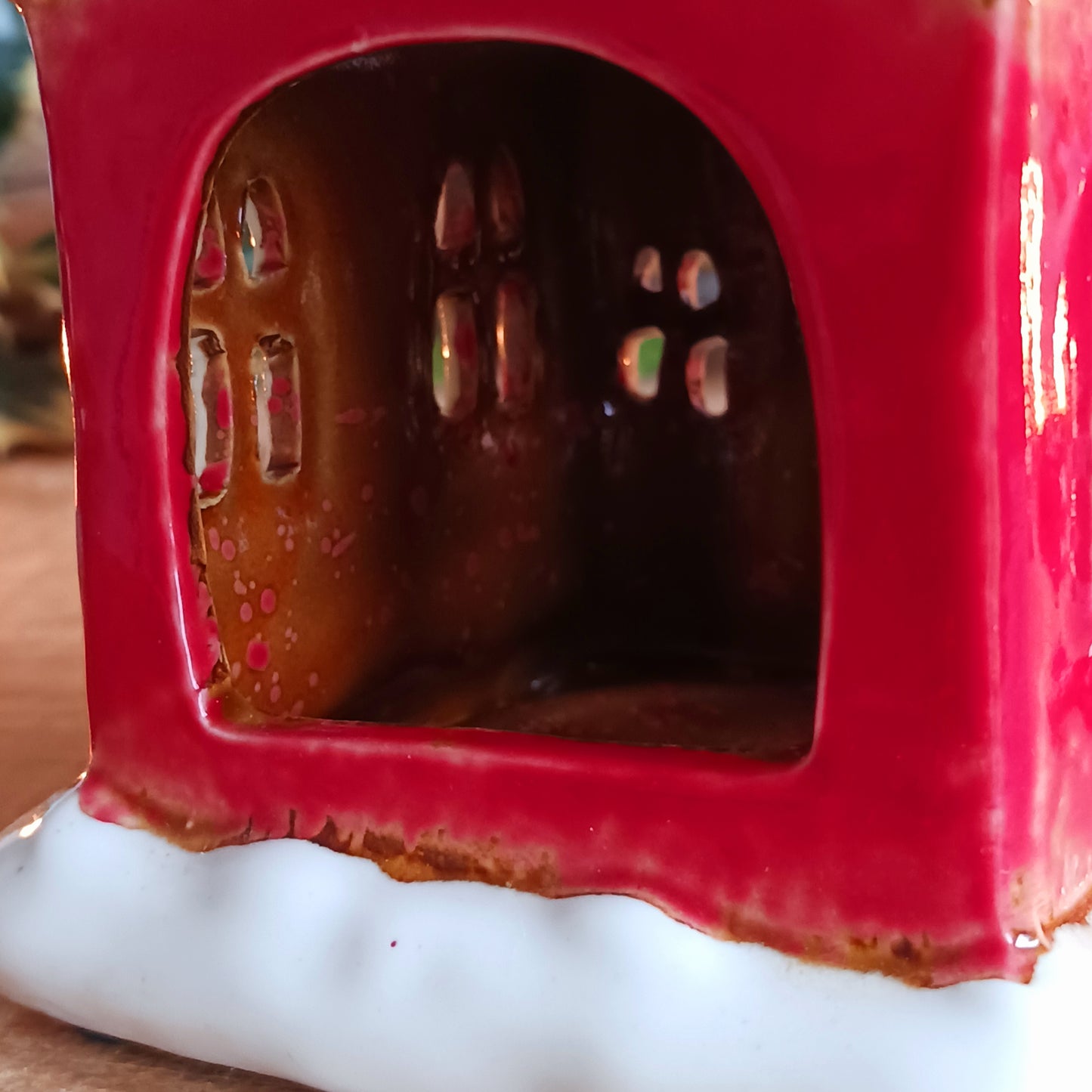 Handcrafted in the Village Pottery workshop, this charming Little Christmas Church Ceramic Tealight Holder brings traditional festive magic into your home. Made from high-quality ceramic with intricate detailing, it captures the timeless beauty of a snow-covered village church.