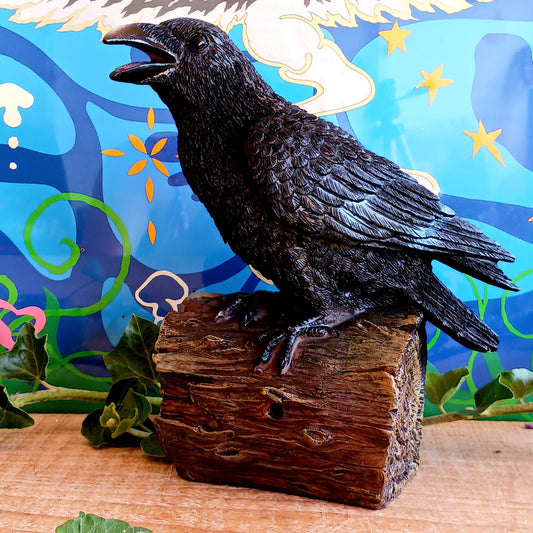 Bring a touch of mystery and nature to your space with this lifelike medium-sized raven figurine. Crafted from high-quality resin, it features meticulously detailed feathers and is perched on a base designed to resemble natural wood. The built-in motion sensor triggers an authentic raven call, adding an interactive and atmospheric element to your décor. Perfect for gothic interiors, nature-inspired arrangements, or as a distinctive gift, this captivating piece blends artistry with surprise for a truly memor