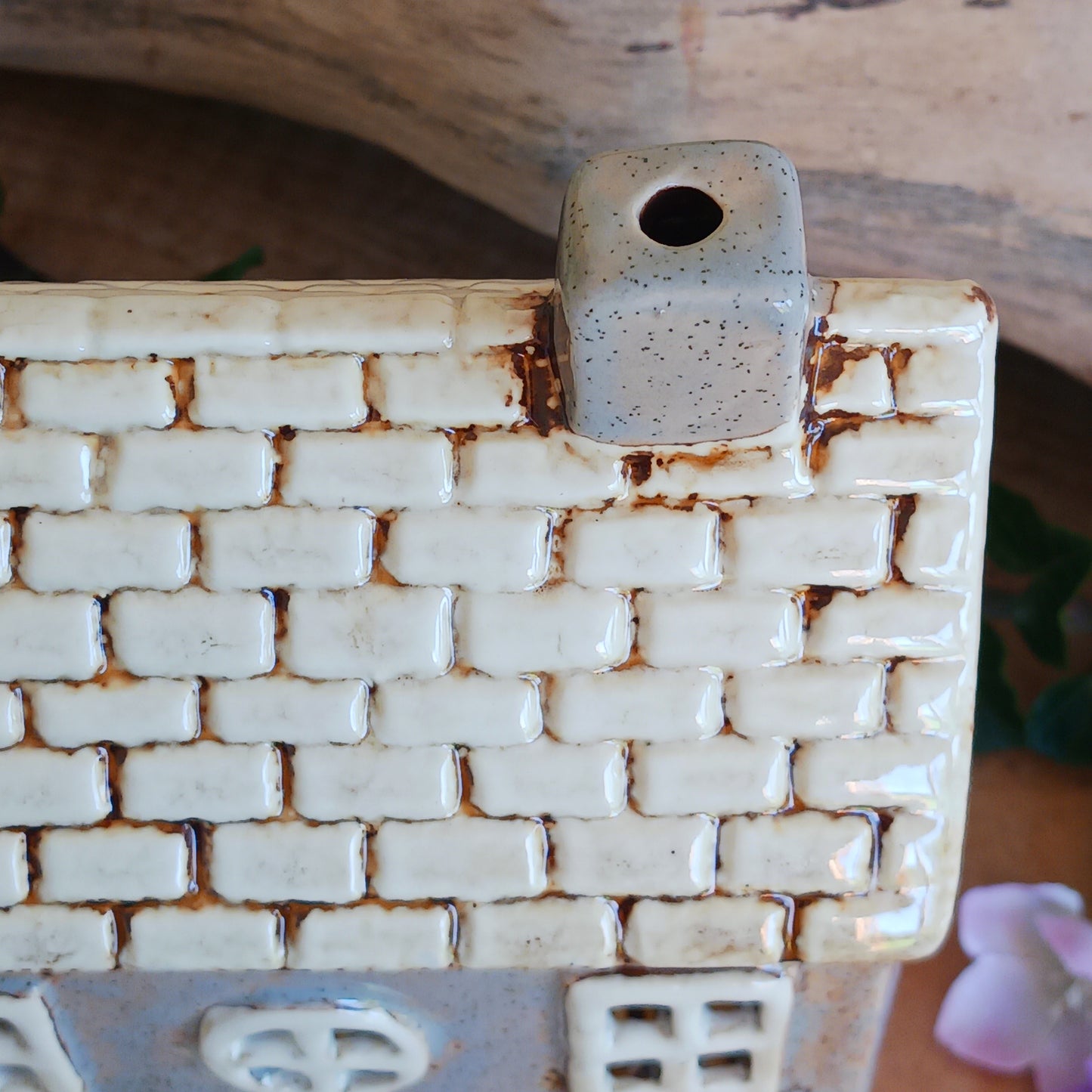At the heart of an enchanted street stands the Corner Shop, its windows glowing softly as if lit by unseen hands. This Shudehill Village Pottery tealight house is crafted from ceramic to capture the quiet magic of village life, where candlelight flickers like whispered exchanges between worlds.