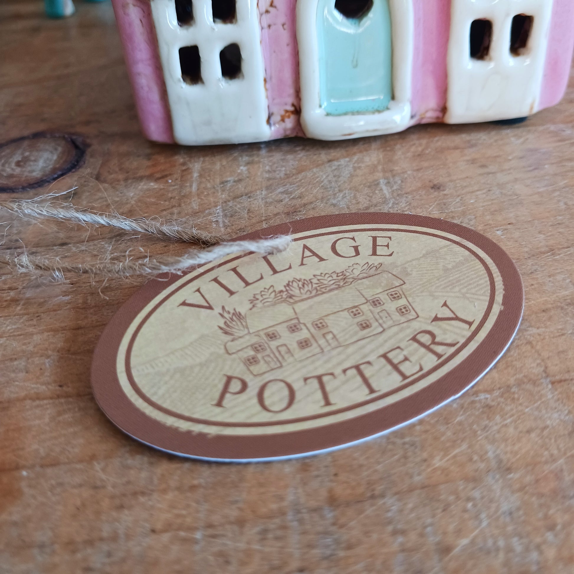 Illuminate your home with the charming Village Pottery Café Tealight Holder. Handcrafted with a rustic pink finish, this cosy piece adds warmth and ambience to any room. Perfect for tealights or simply as a decorative ornament, it’s a delightful addition to shelves, windowsills, or coffee tables. Pair with other pieces from the Village Pottery Collection to create your own quaint, decorative village.