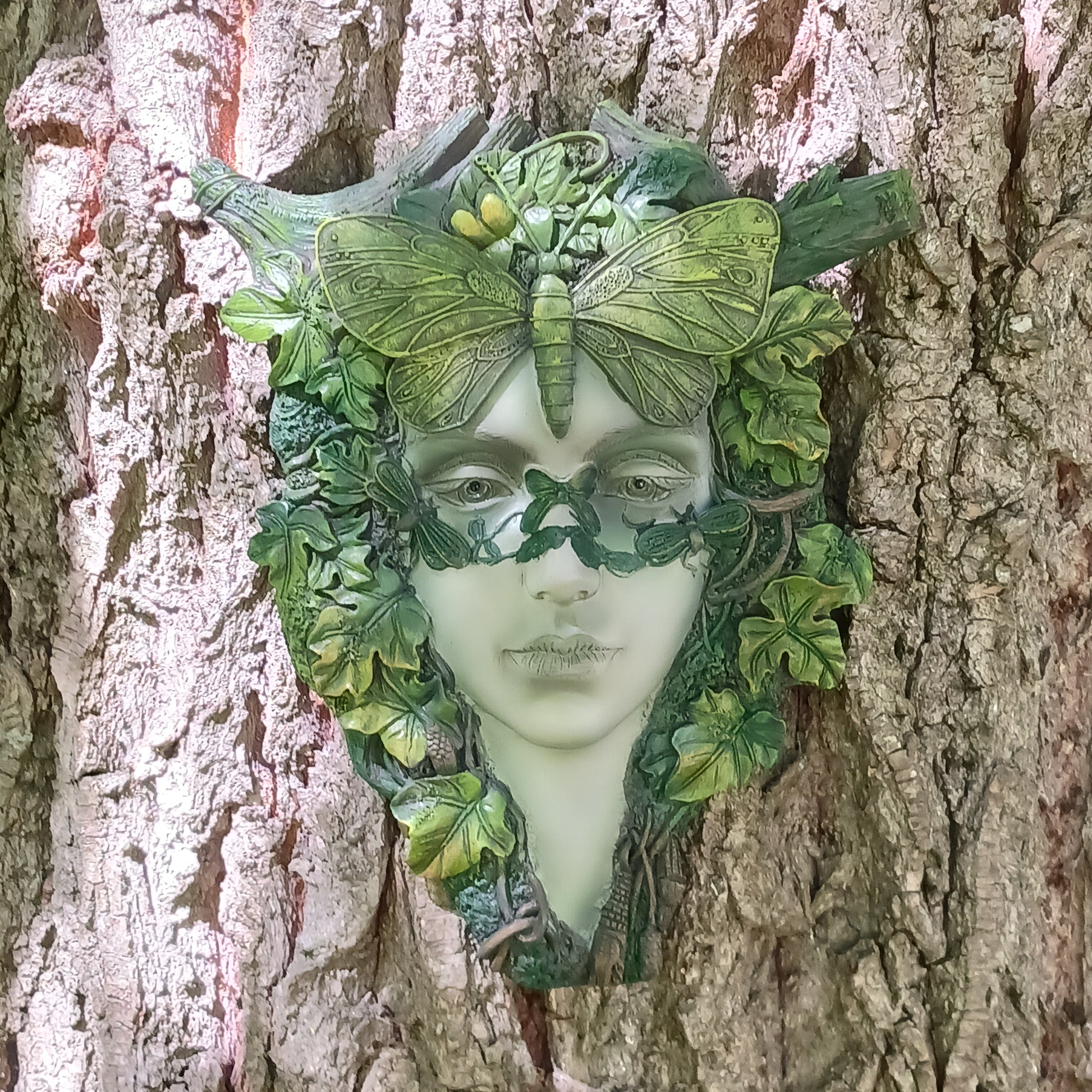 Bring the enchanting beauty of the forest into your home or garden with this stunning Green Goddess Resin Wall Plaque. Beautifully crafted with intricate leafy details, twisting branches and a striking butterfly crown, this decorative plaque captures the spirit of nature, growth and feminine energy.