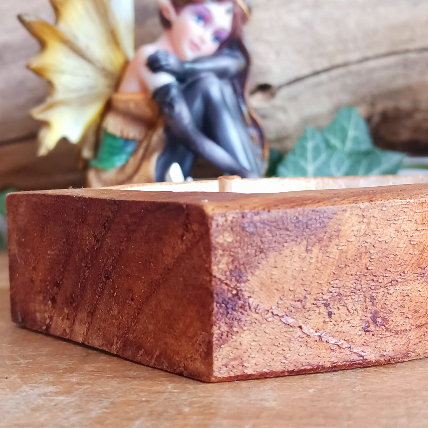 Welcome a touch of woodland magic into your space with this Fairy Door Woodcarving, a beautifully handcrafted piece inspired by folklore and nature. Each door is carved from natural wood using traditional techniques, making every one unique and full of character.