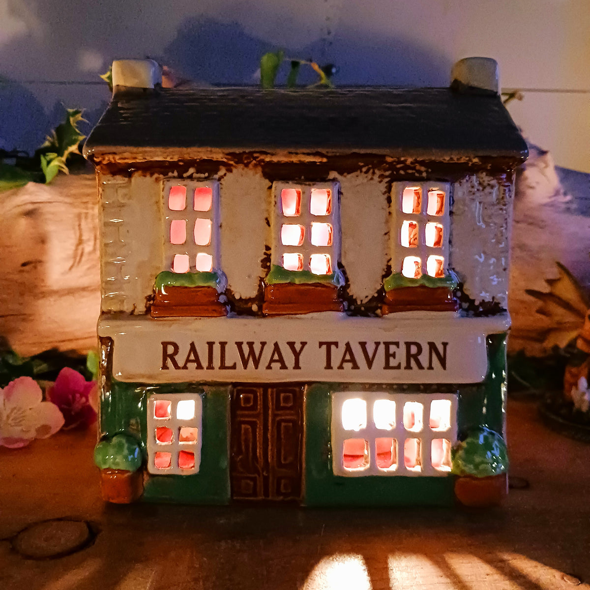 Bring a little British village charm into your home with this delightful Village Tavern Tealight Holder, beautifully hand-crafted in ceramic and hand-painted with charming, characterful details.