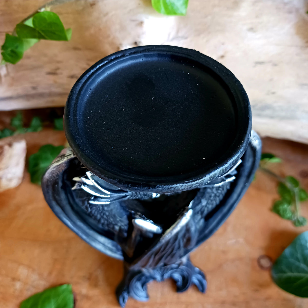Add a touch of mythical drama to your home with the Dark Heart Candle Holder, a beautifully crafted fantasy ornament featuring two dragons lovingly positioned head-to-head to hold a single tealight or pillar candle.