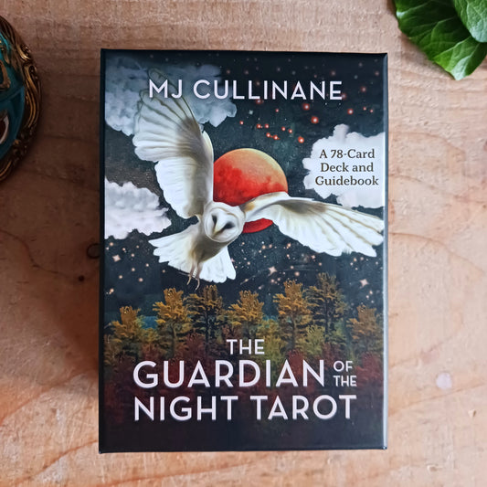 Step into the wisdom of the night with The Guardian of the Night Tarot Deck by MJ Cullinane, a beautifully illustrated 78-card tarot deck with a companion guidebook. This unique deck uses powerful animal symbolism from cultures around the world to illuminate light within darkness, offering guidance during times of uncertainty, transformation, and introspection.