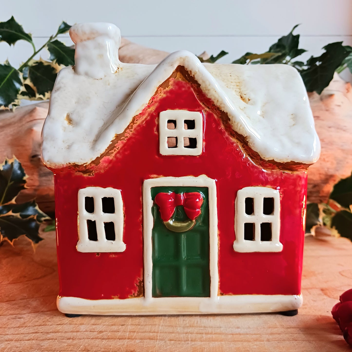 Bring timeless festive charm to your home with this hand-crafted Christmas Traditional House Tealight Holder from The Village Pottery. Carefully shaped in ceramic and finished with rustic detailing, it captures the magic of a snow-covered village scene. 