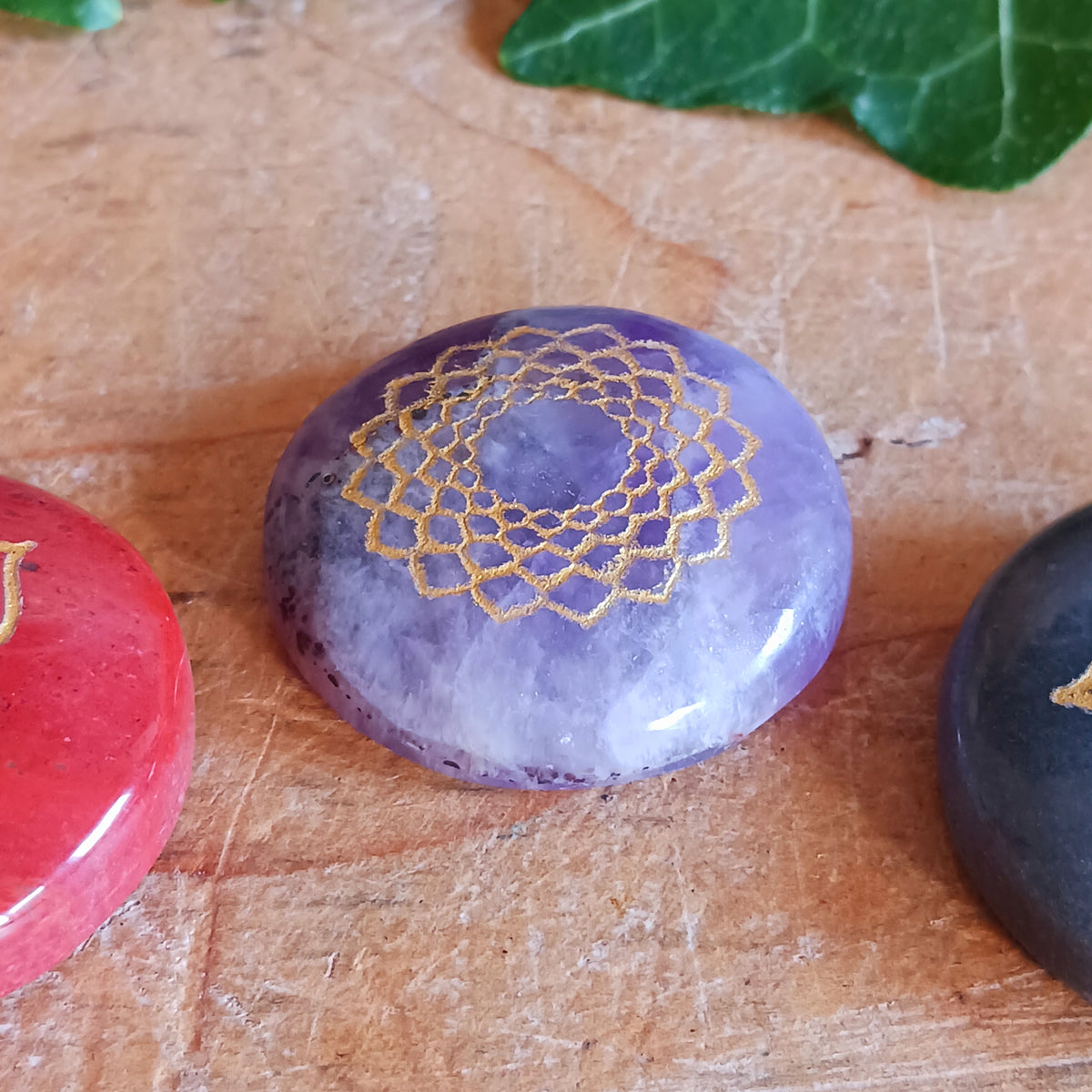 Bring balance and focus to your spiritual practice with this Seven Chakra Crystal Stone Set. Featuring seven natural crystal discs, each engraved with the symbol of a different chakra, this set is ideal for meditation, crystal therapy, yoga and other spiritual practices.