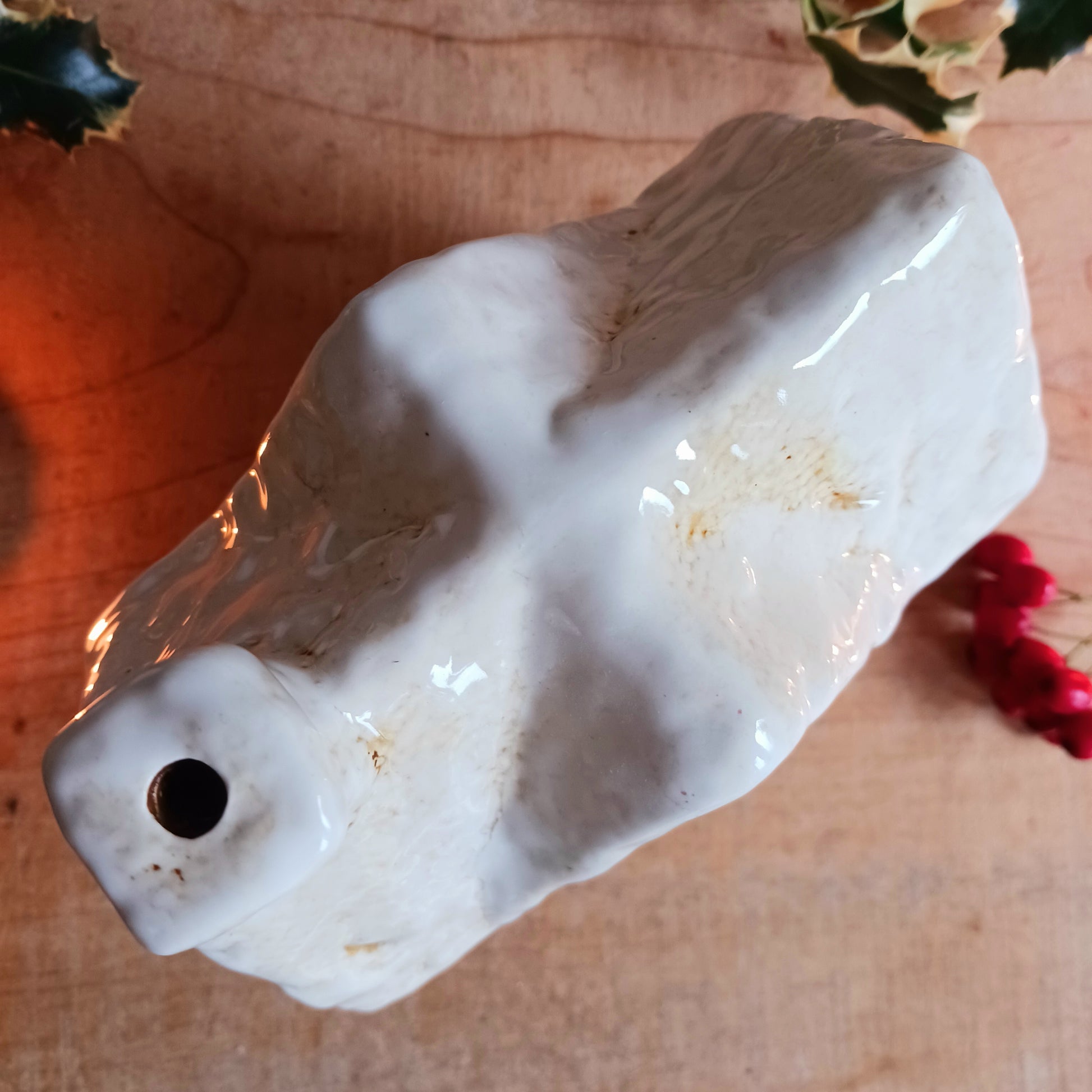 Bring timeless festive charm to your home with this hand-crafted Christmas Traditional House Tealight Holder from The Village Pottery. Carefully shaped in ceramic and finished with rustic detailing, it captures the magic of a snow-covered village scene. 
