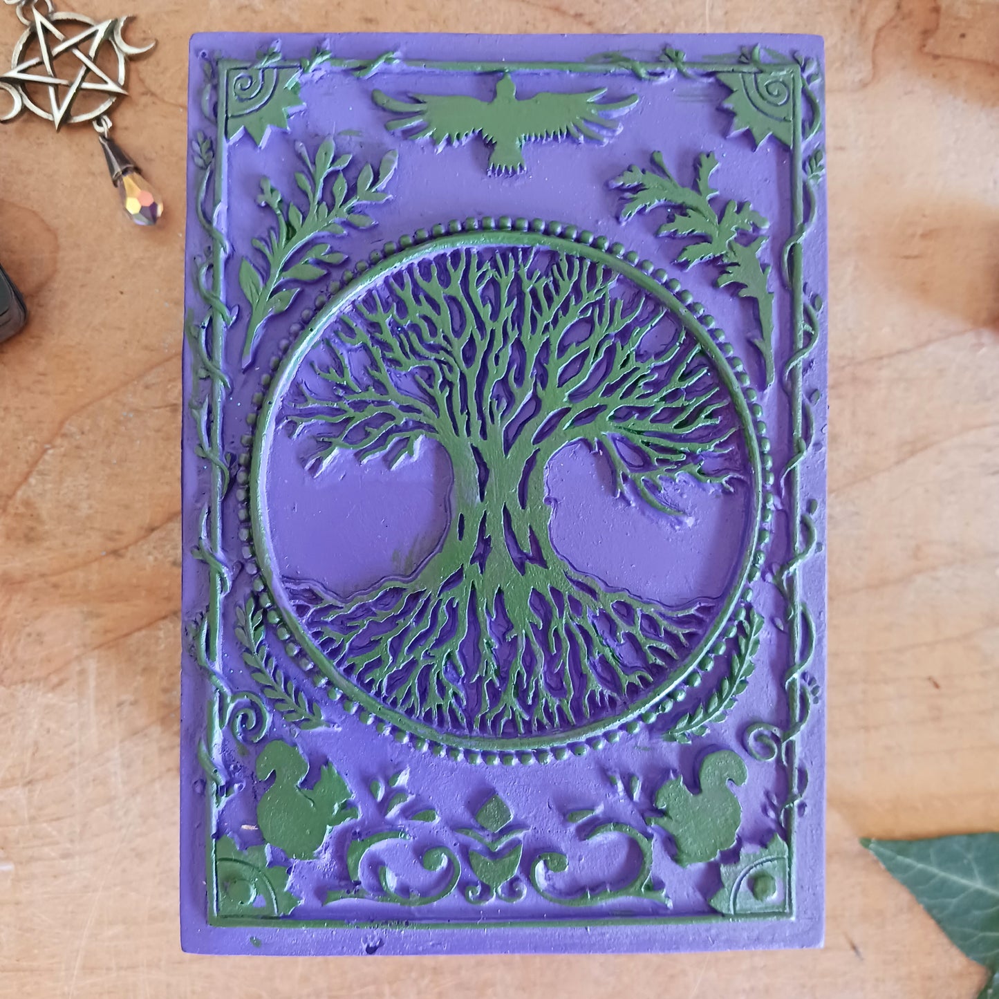 Bring magic, beauty, and function to your space with this exquisite hand-painted Tree of Life Wooden Box. Perfect for housing Tarot or Oracle decks, storing jewellery, trinkets, herbs, sage, spells, Feng Shui items, incense, stamps, and more, this vibrant box is as versatile as it is beautiful. The intricate Tree of Life design adds spiritual symbolism and charm, making it a stunning statement piece for your altar, desk, or shelf.