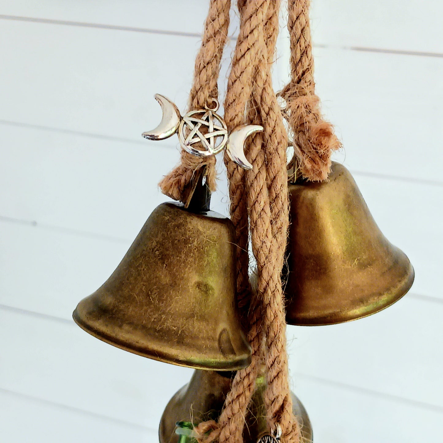 Transform your home into a sanctuary of peace and protection with these enchanting Witches Protection Bells. Each set includes beautifully crafted bells adorned with little charms, offering both visual elegance and soothing auditory magic.