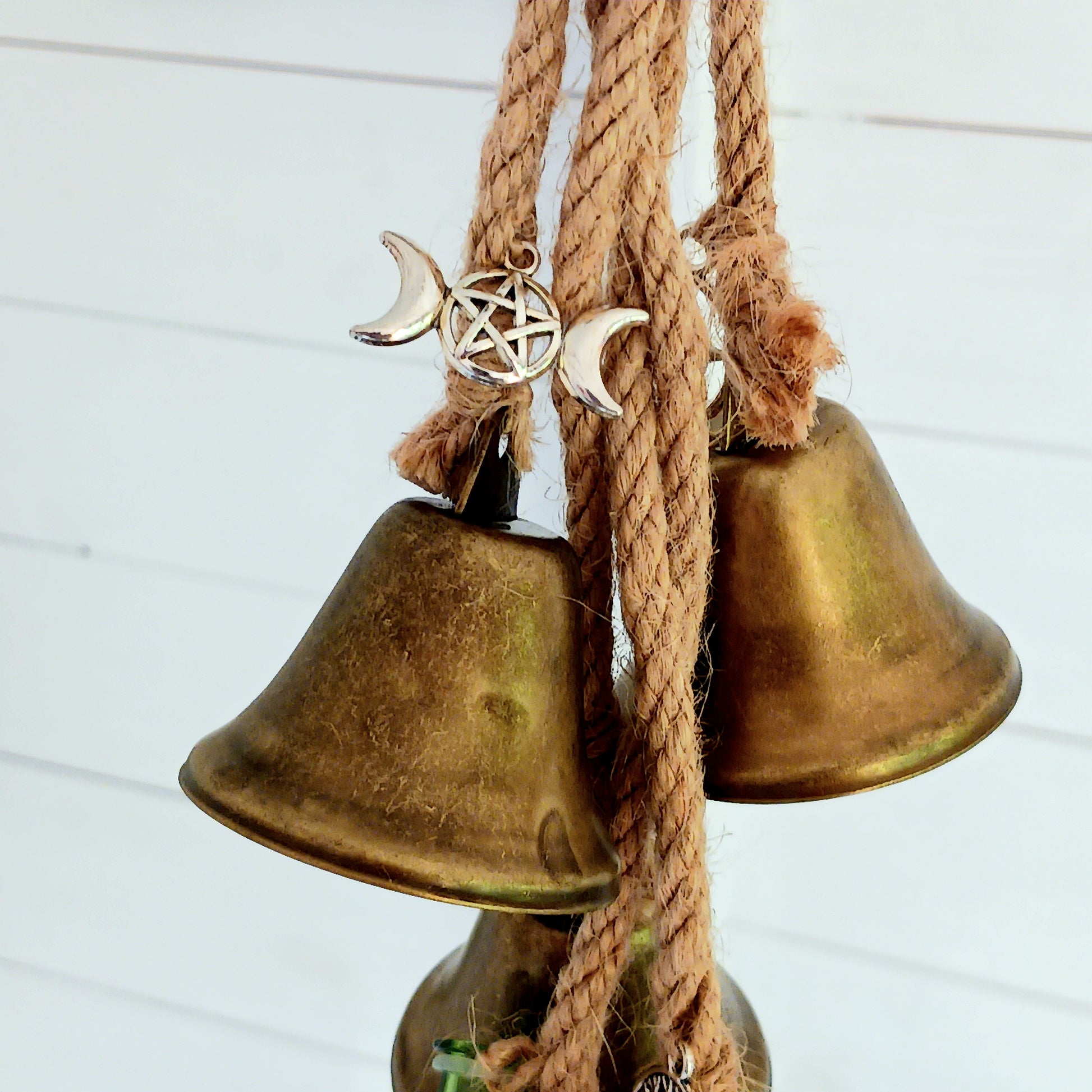 Transform your home into a sanctuary of peace and protection with these enchanting Witches Protection Bells. Each set includes beautifully crafted bells adorned with little charms, offering both visual elegance and soothing auditory magic.